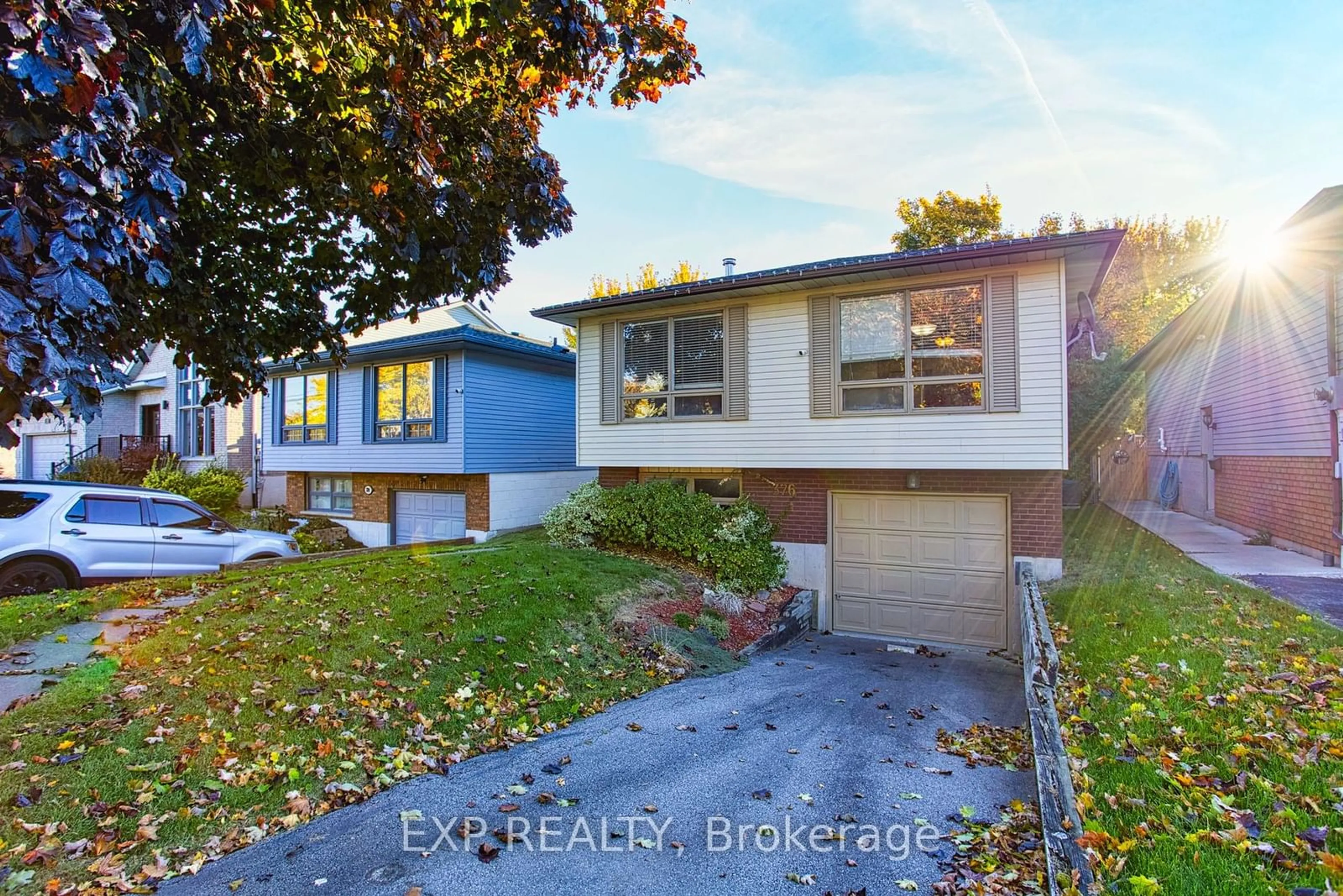 Frontside or backside of a home, the fenced backyard for 376 Rexford Dr, Hamilton Ontario L8W 2M6