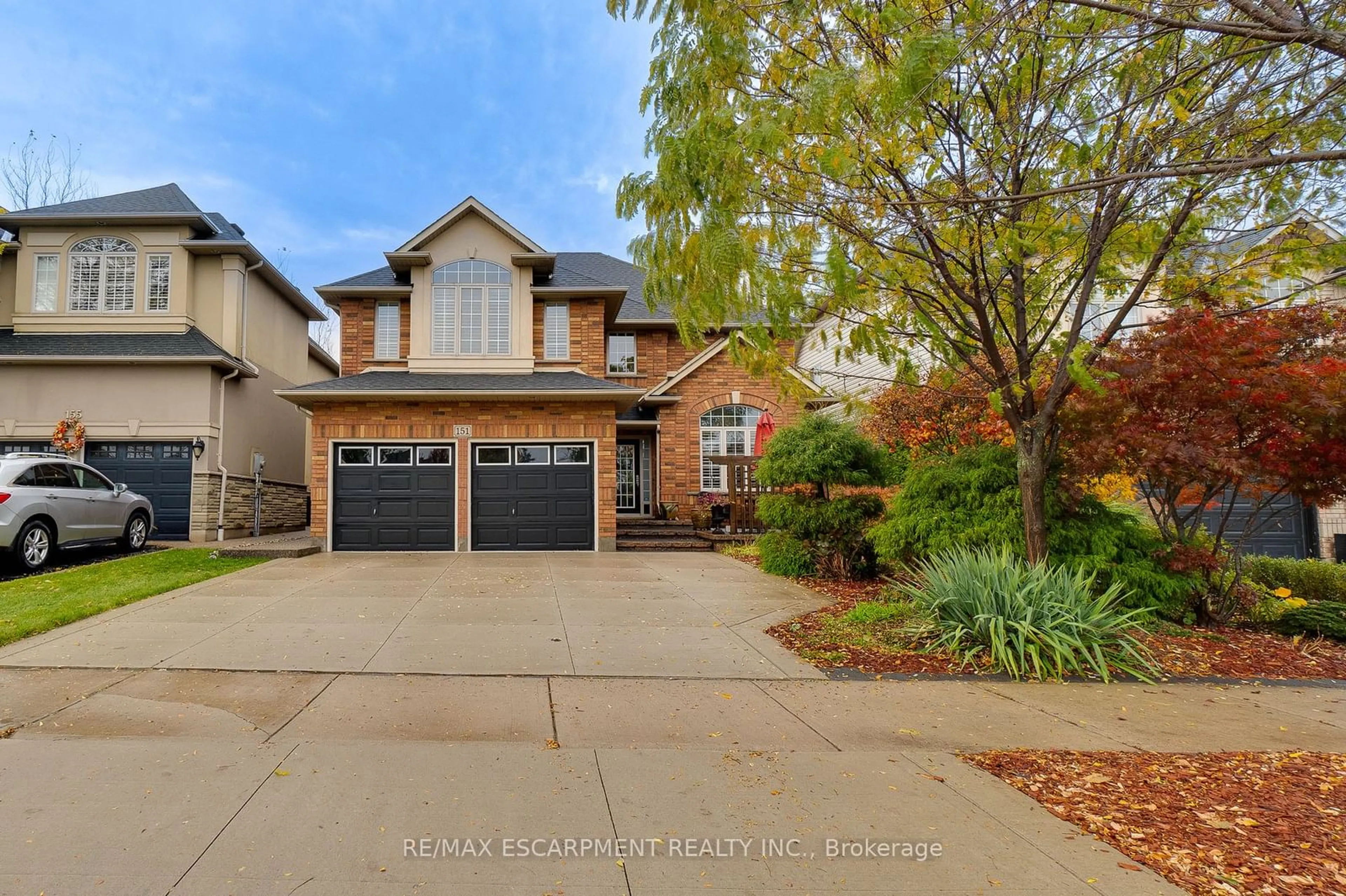 Frontside or backside of a home, the street view for 151 Moorland Cres, Hamilton Ontario L9K 1P1