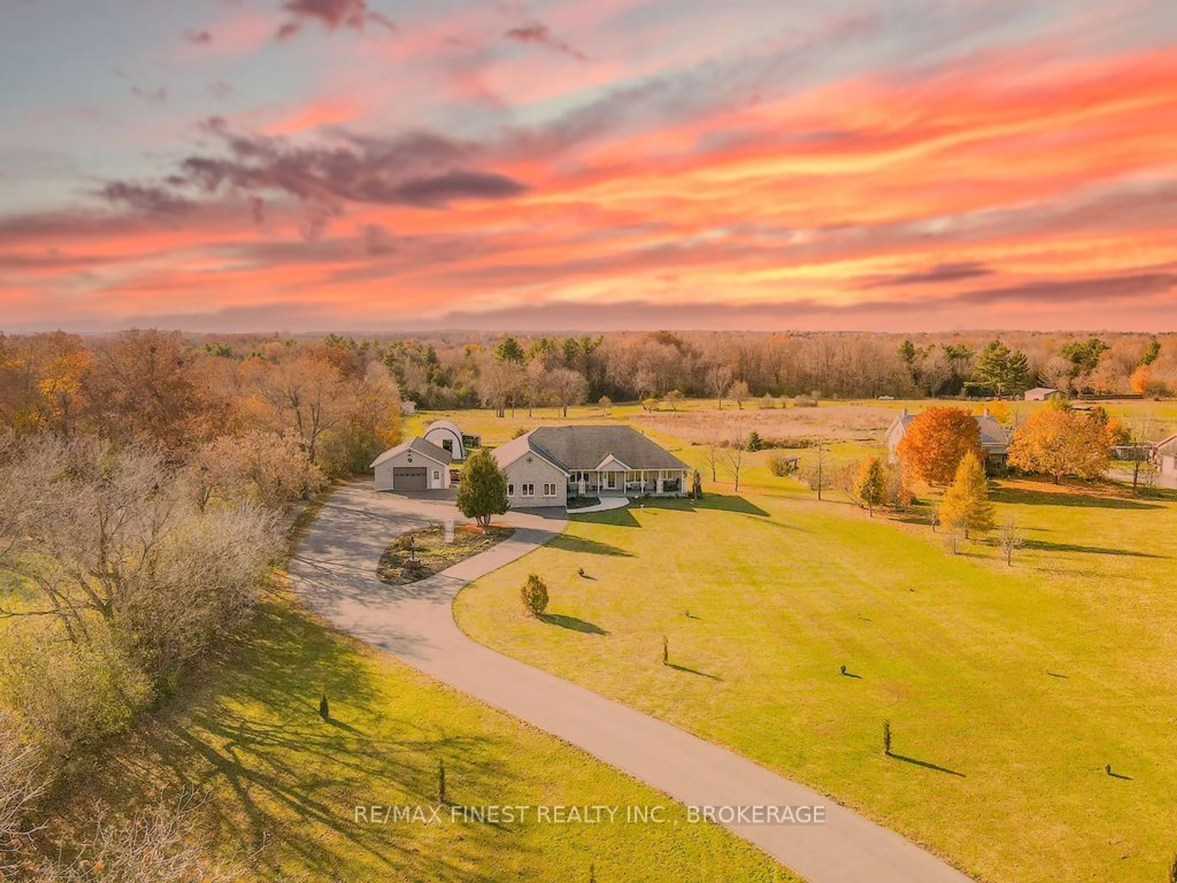 Frontside or backside of a home, the fenced backyard for 4987 Bedford Rd, South Frontenac Ontario K0K 2T0