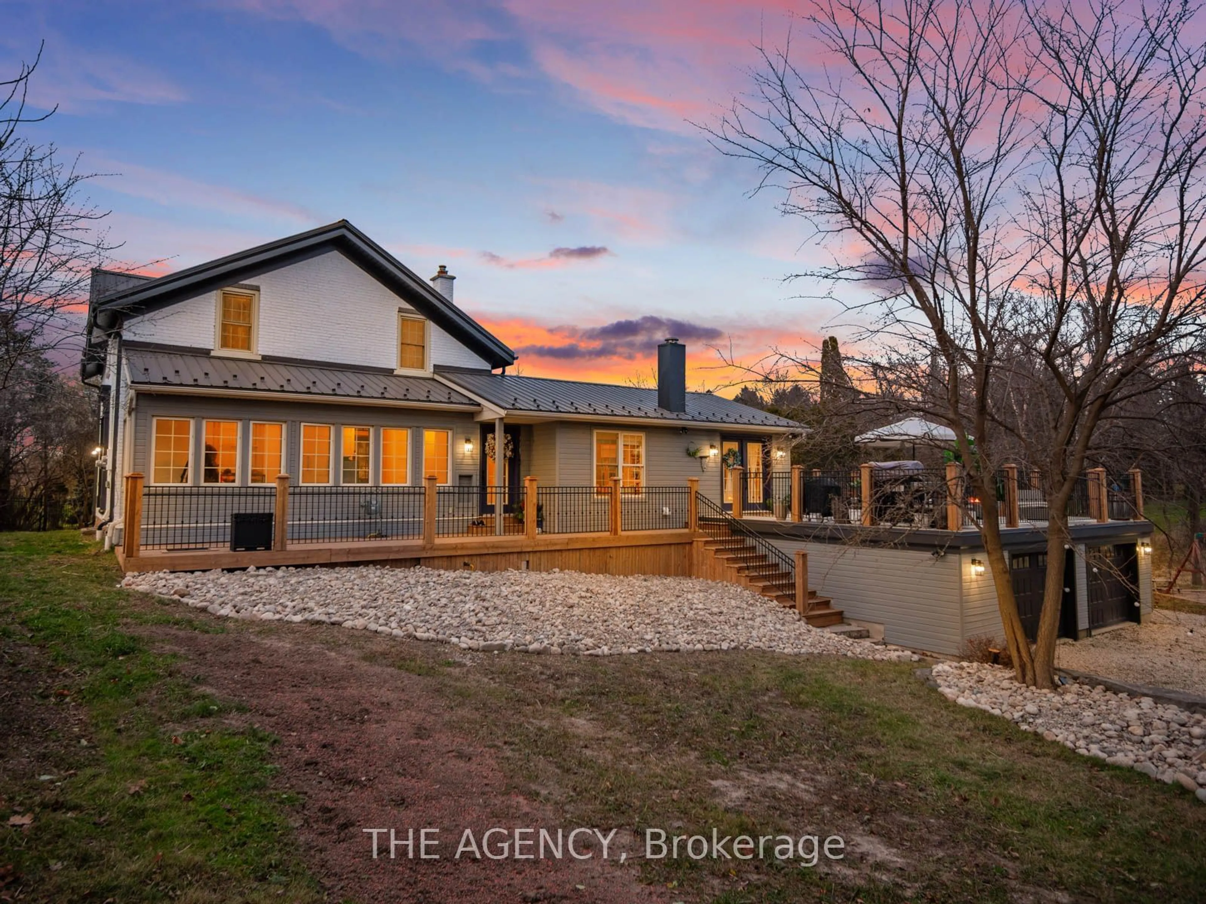 Frontside or backside of a home, the fenced backyard for 1349 Queen St, Waterloo Ontario N0B 2E0