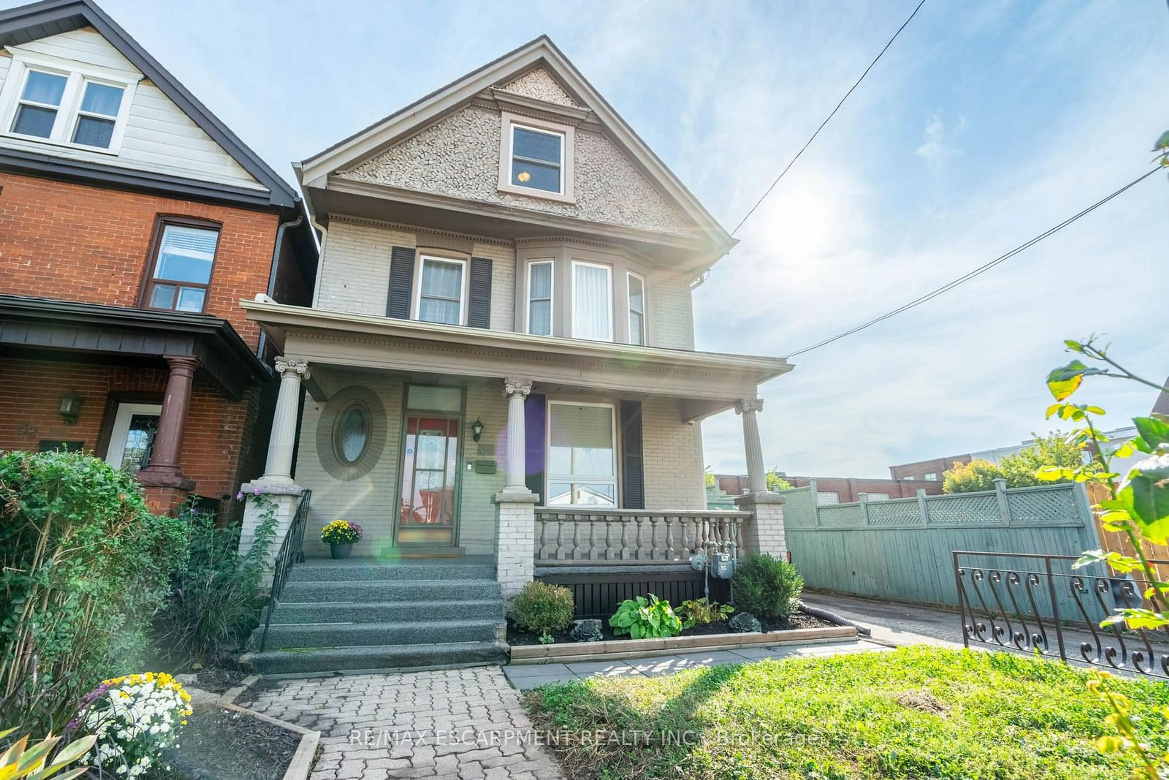 Frontside or backside of a home, the street view for 30 Bristol St, Hamilton Ontario L8L 2T8