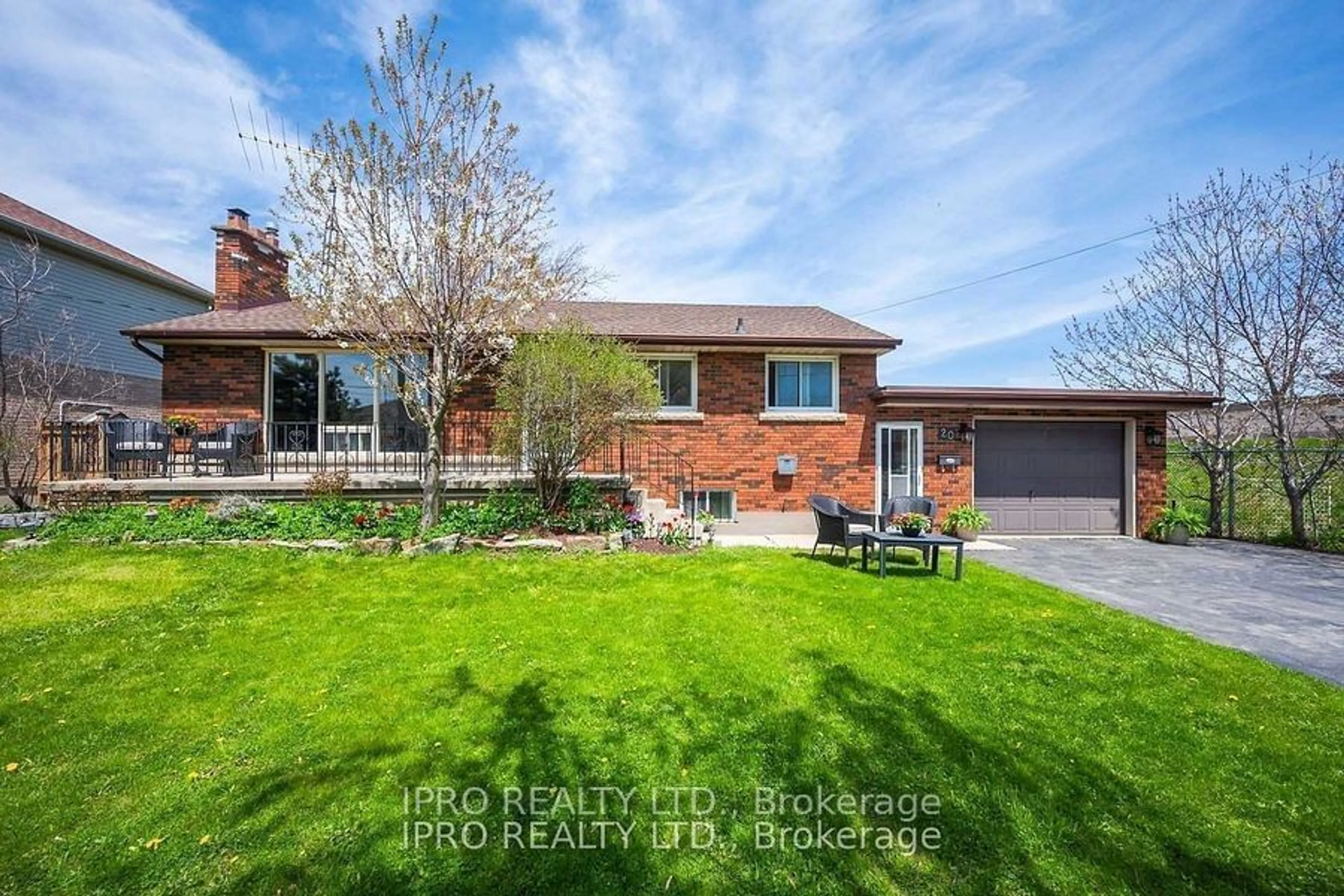 Frontside or backside of a home, the fenced backyard for 20 Highland Rd, Hamilton Ontario L8J 2T7