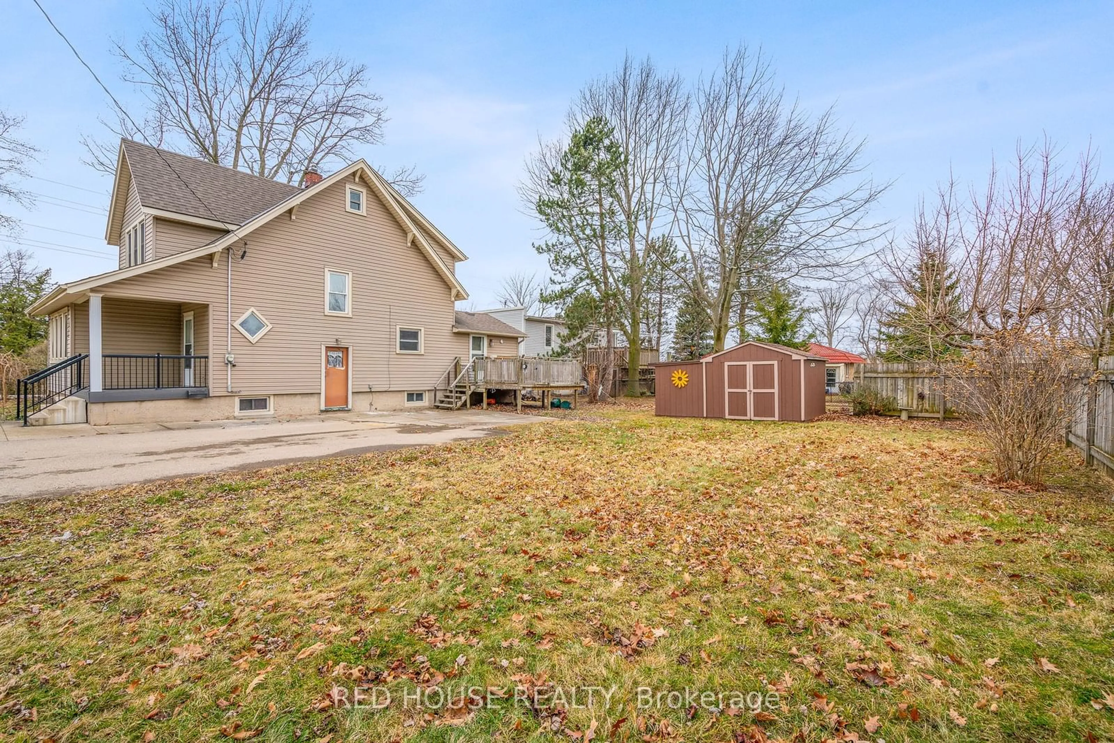 Frontside or backside of a home, the fenced backyard for 3866 Elm St, Fort Erie Ontario L0S 1N0