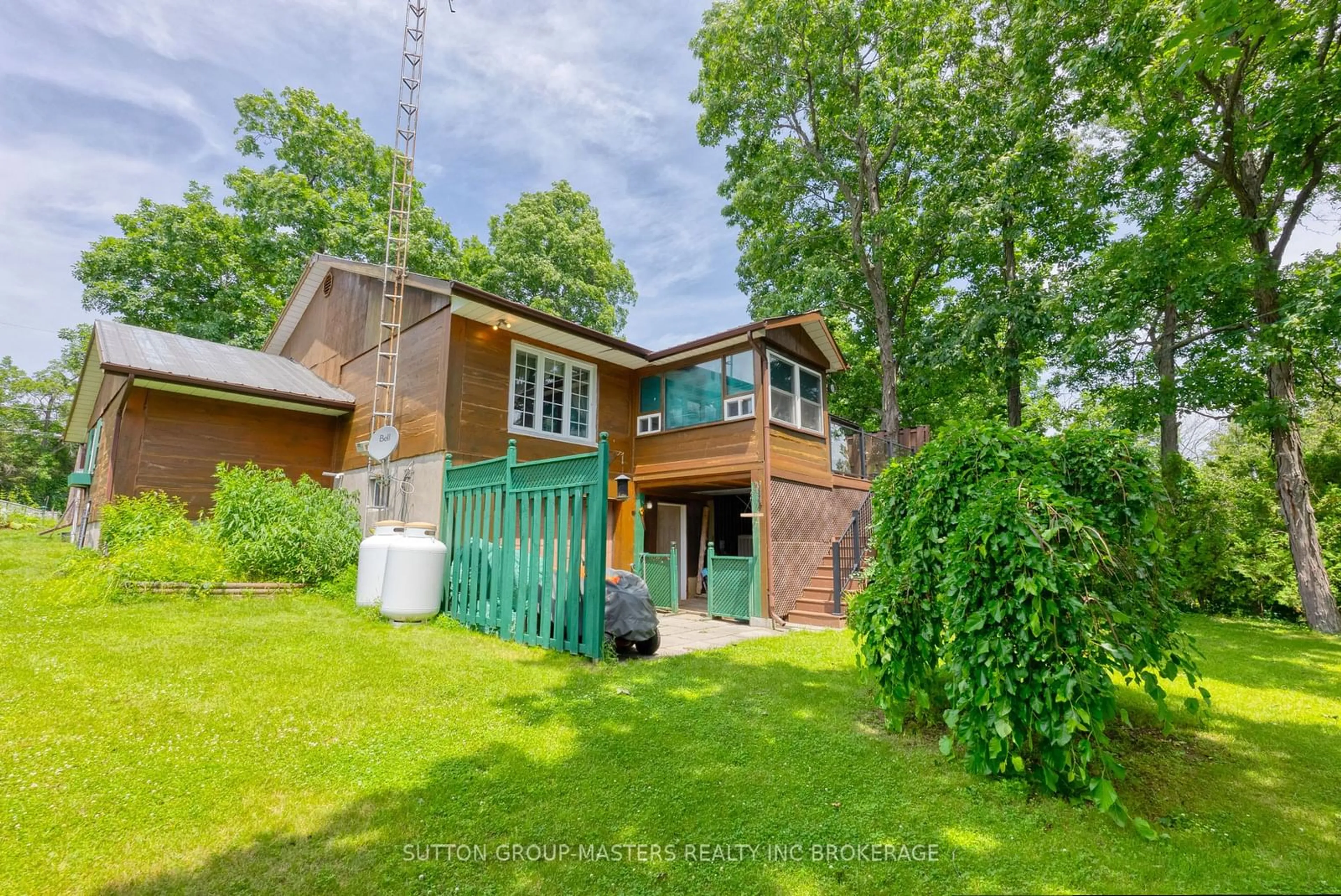 Frontside or backside of a home, cottage for 409 RED CEDAR POINT Rd, Stone Mills Ontario K0K 3N0