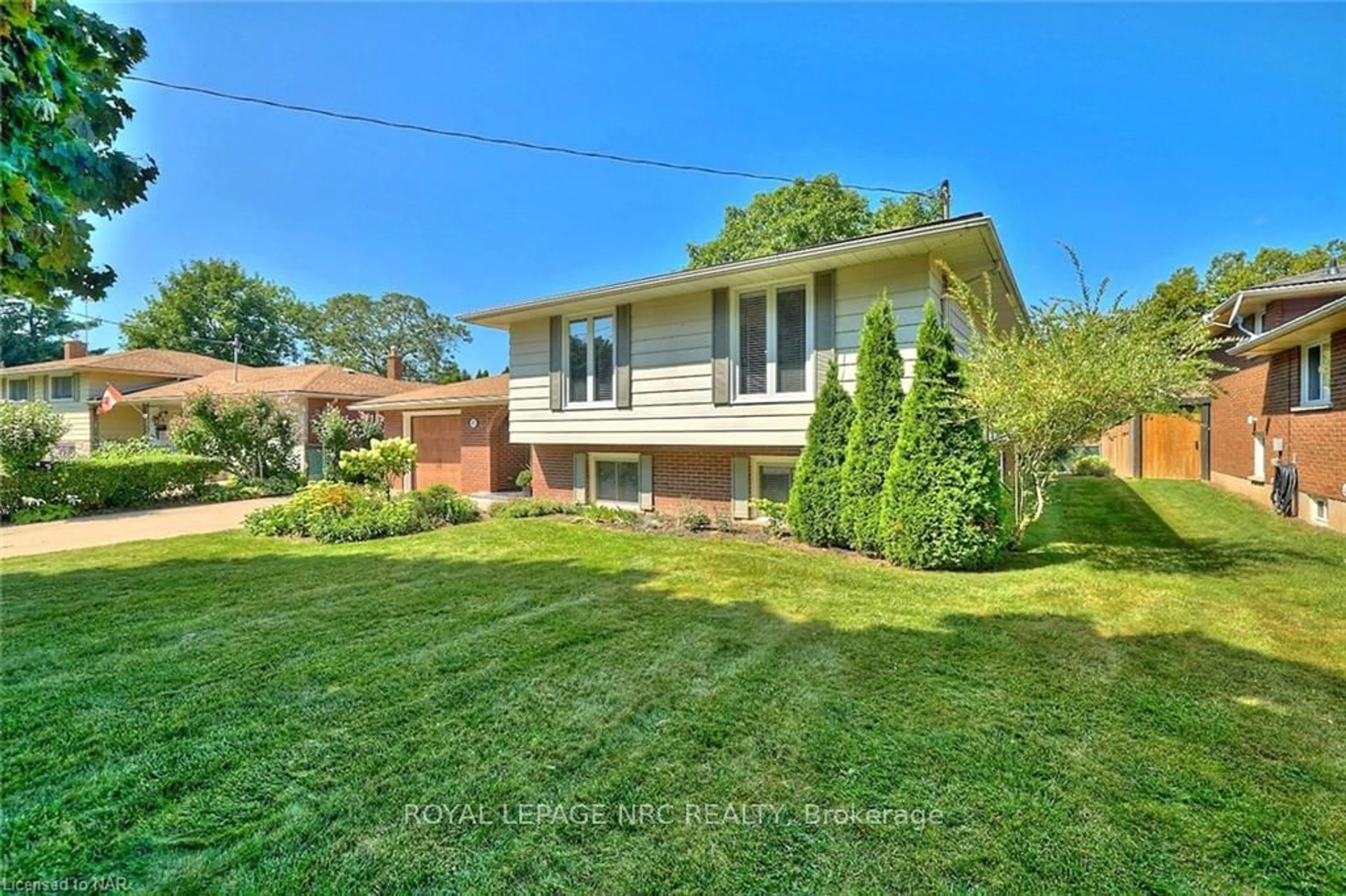 A pic from exterior of the house or condo, the fenced backyard for 47 MONARCH PARK Dr, St. Catharines Ontario L2M 3Z8