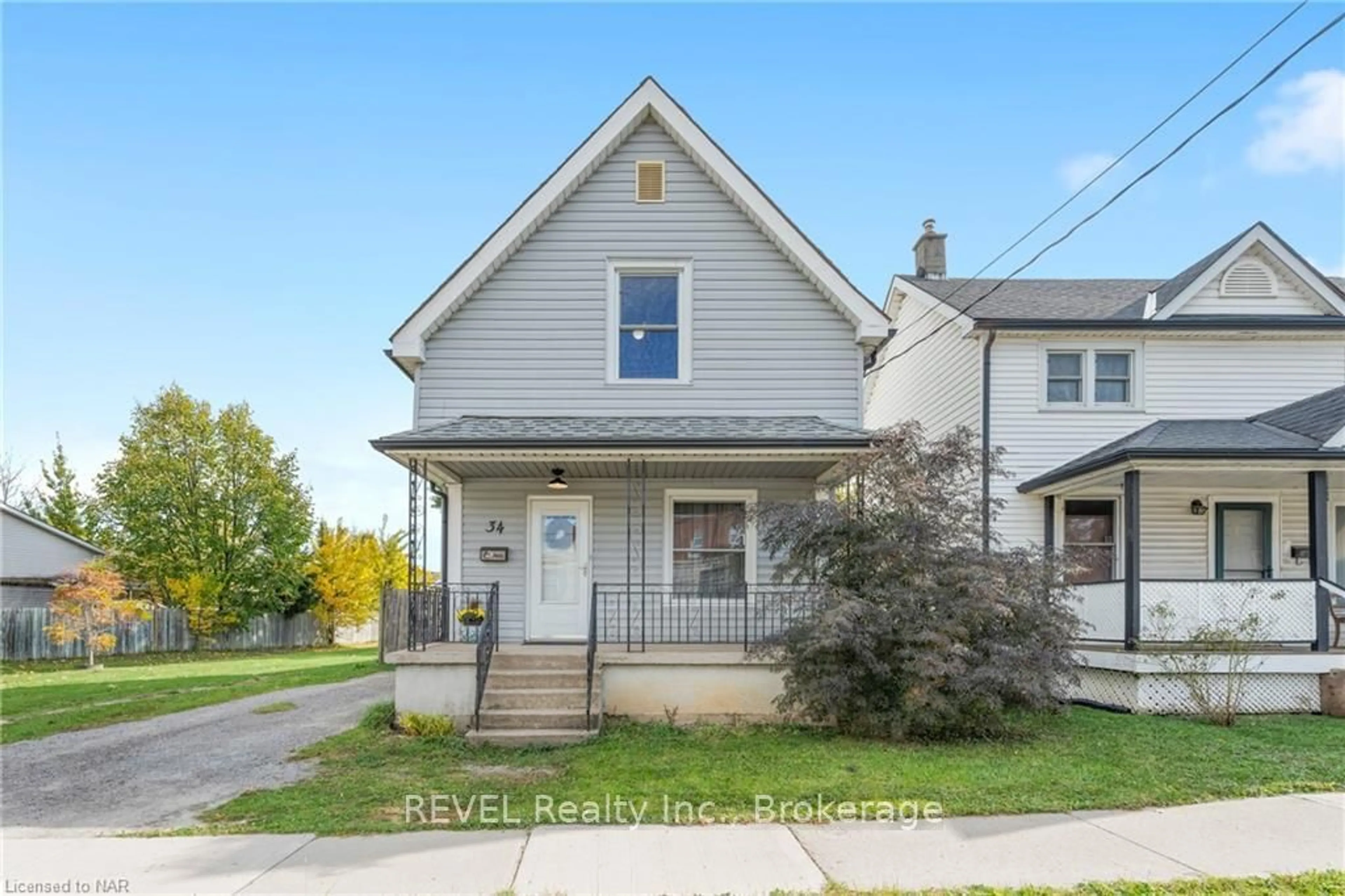 Frontside or backside of a home, the street view for 34 TASKER St, St. Catharines Ontario L2R 3Z8