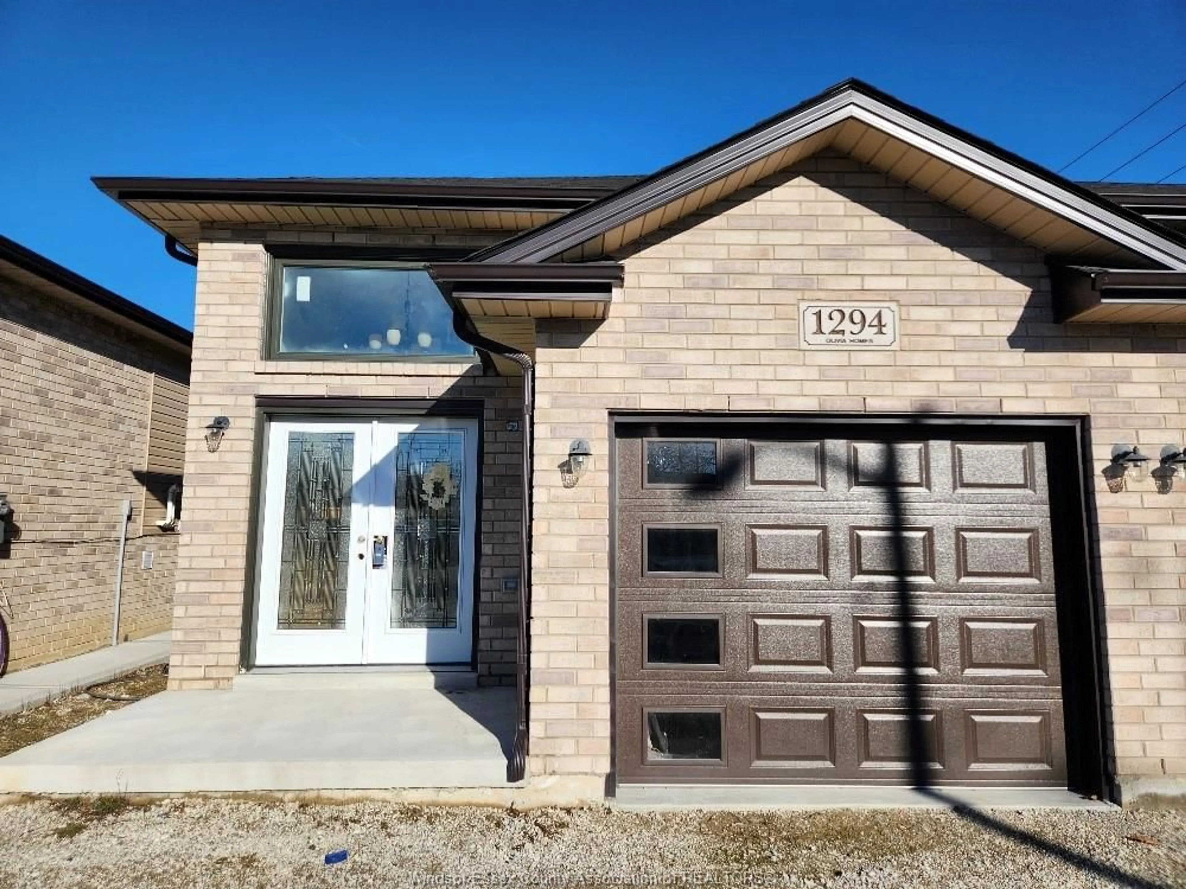 Home with brick exterior material for 1294 TOURANGEAU, Windsor Ontario N8Y 4H8