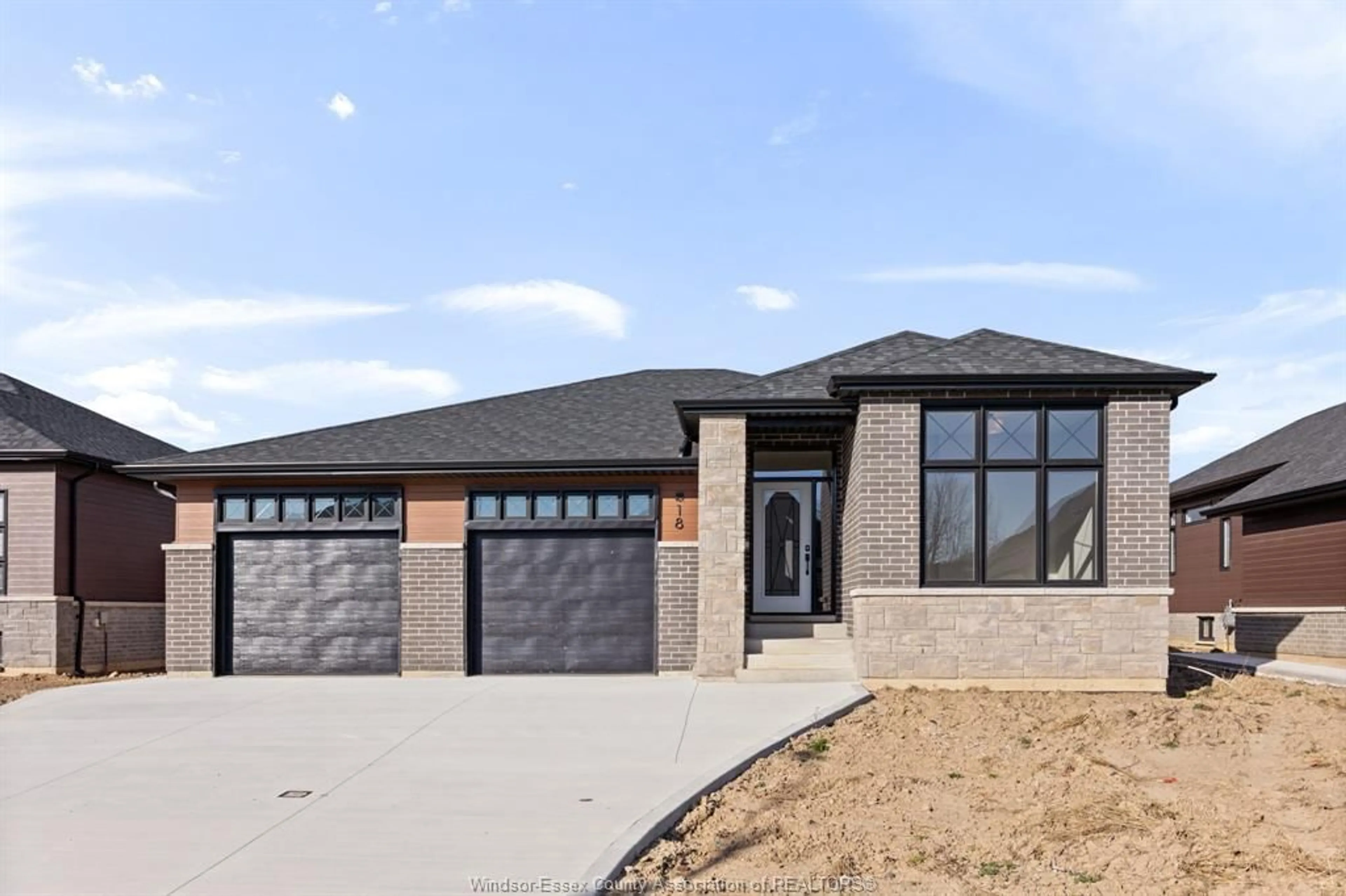 Home with brick exterior material for 18 WOODLAND, Kingsville Ontario N9Y 0A9