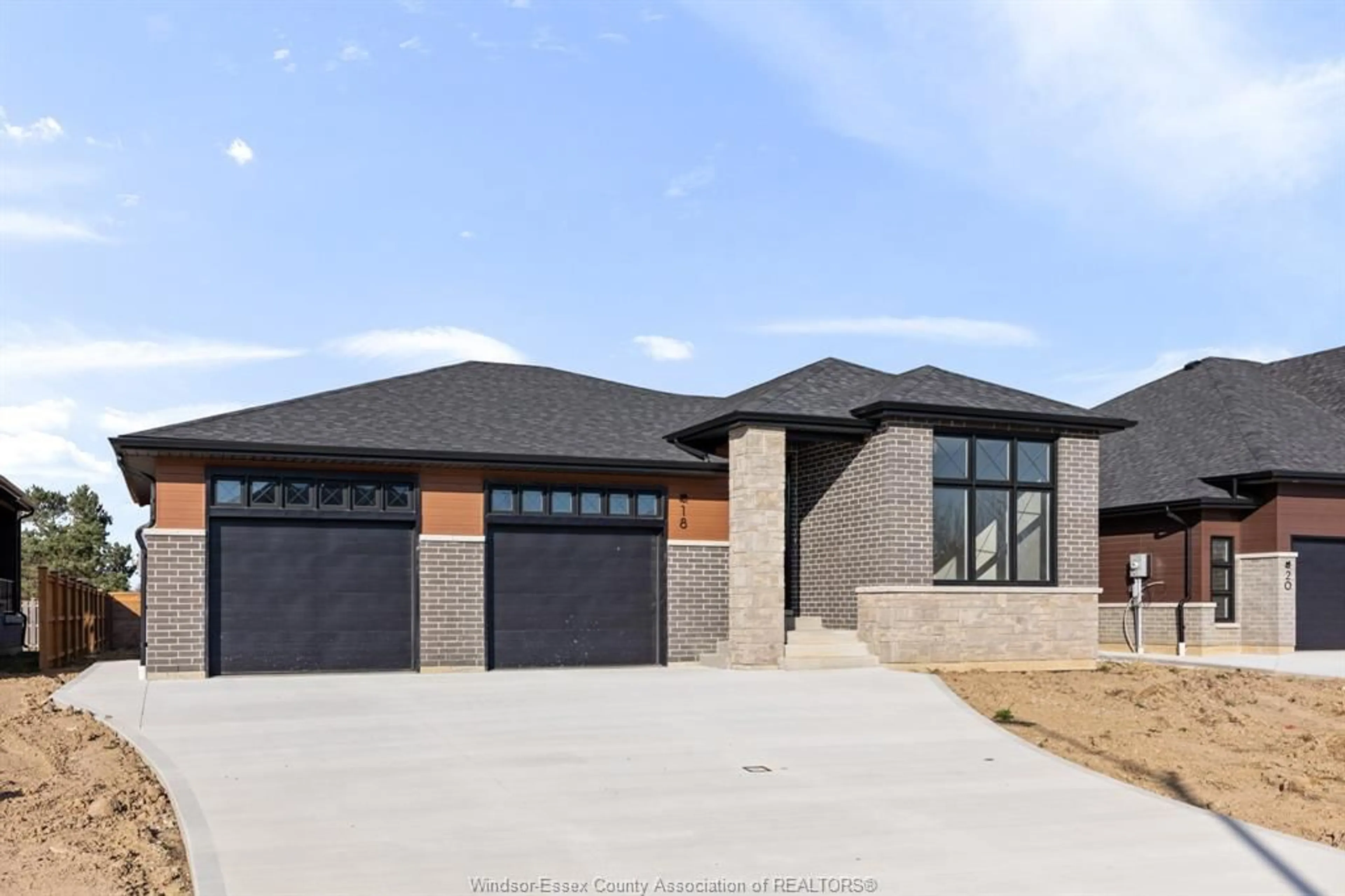 Home with brick exterior material for 18 WOODLAND, Kingsville Ontario N9Y 0A9