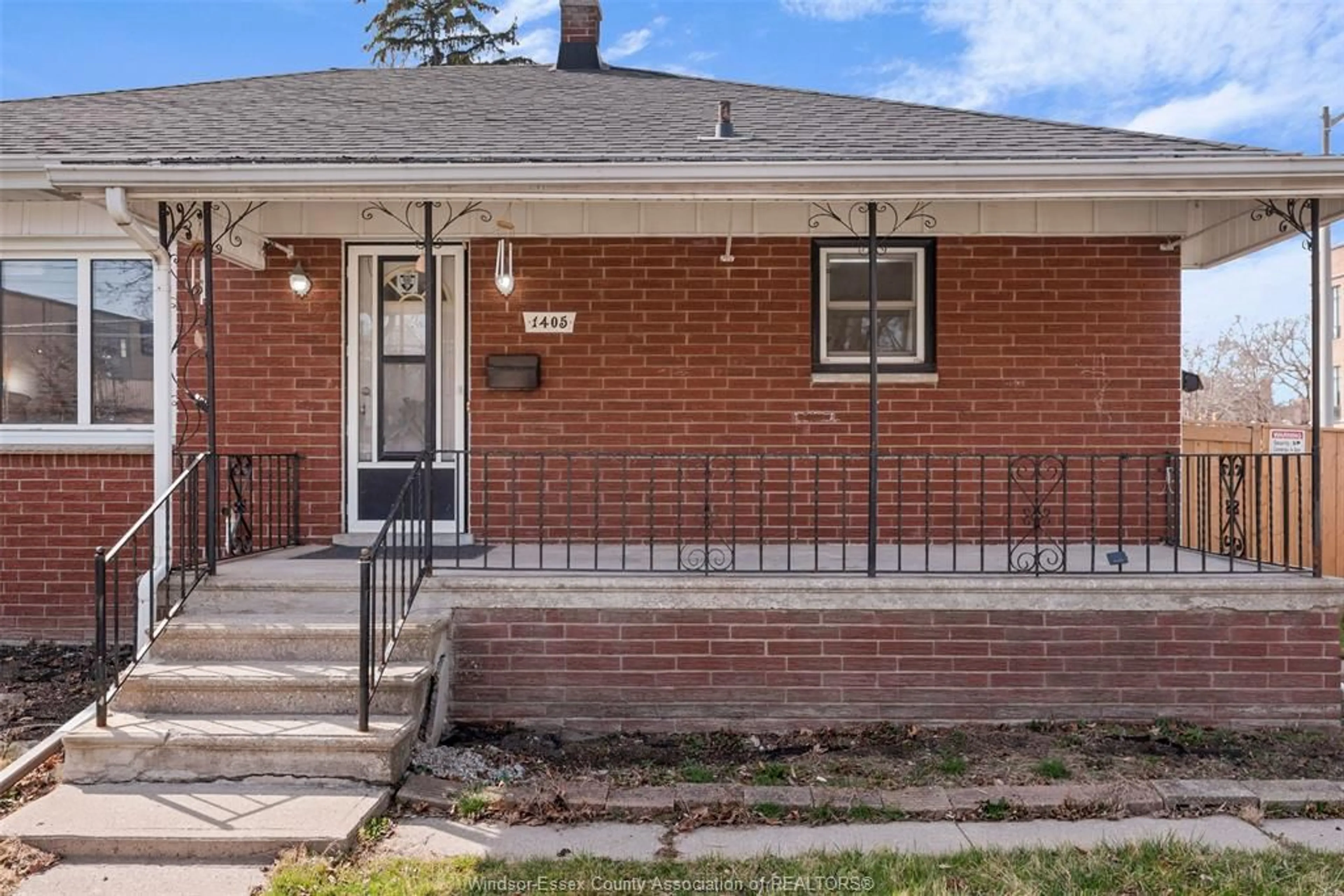 Home with brick exterior material for 1405 PELISSIER St, Windsor Ontario N8X 1M7