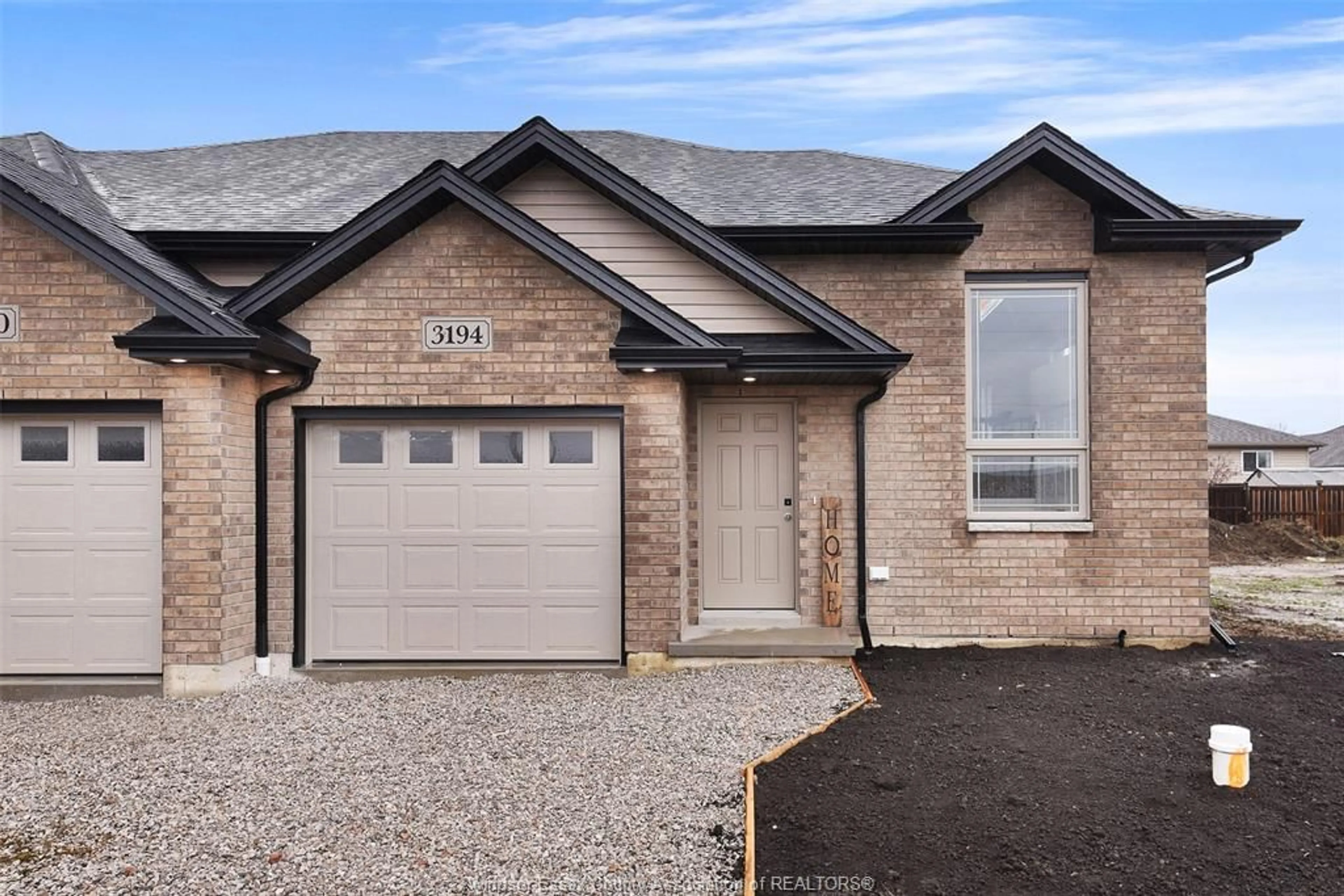 Home with brick exterior material for 3194 VIOLA Cres, Windsor Ontario N8M 0A3