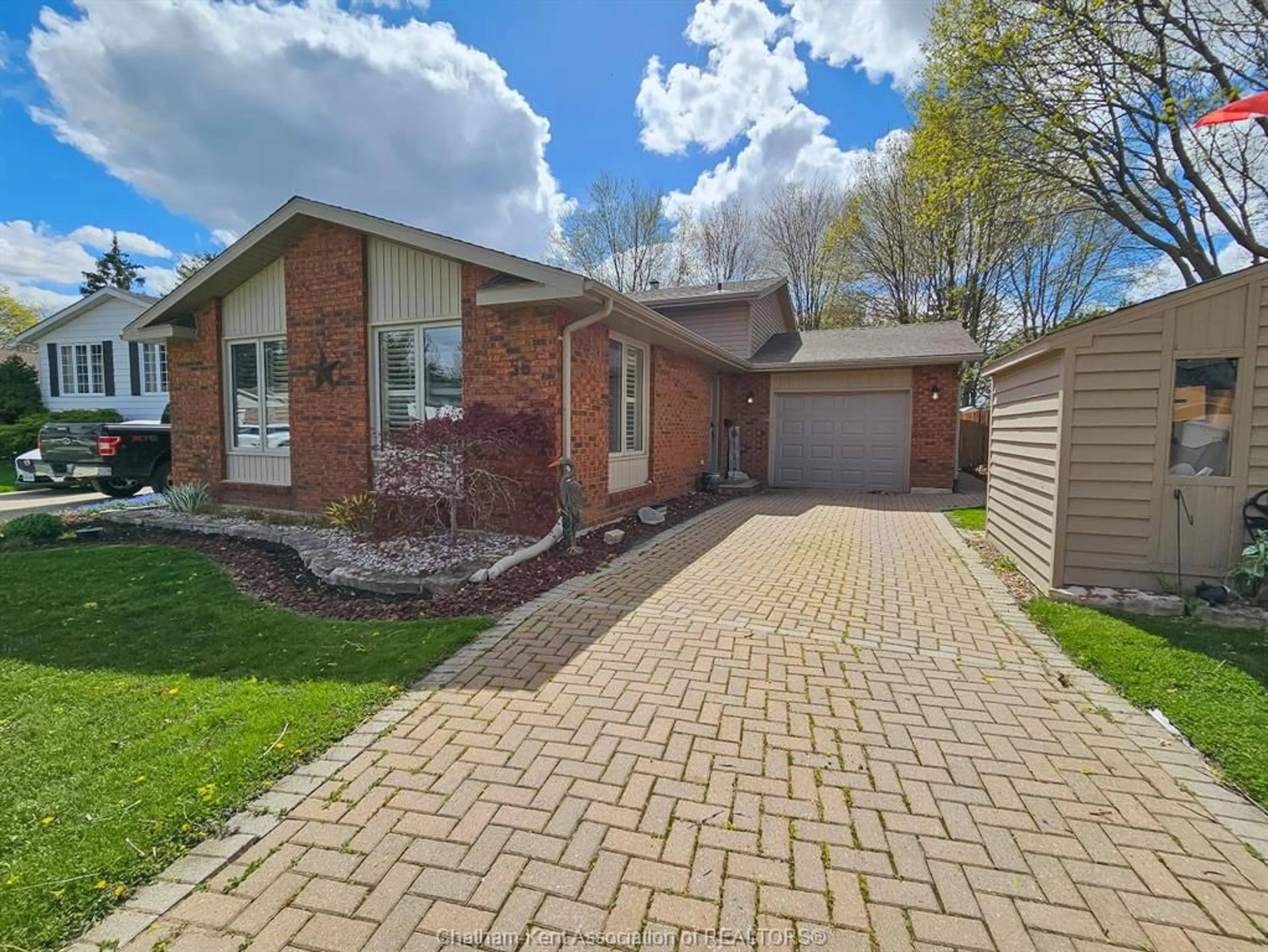 Home with brick exterior material for 56 Collegiate Dr, Chatham Ontario N7L 4R1