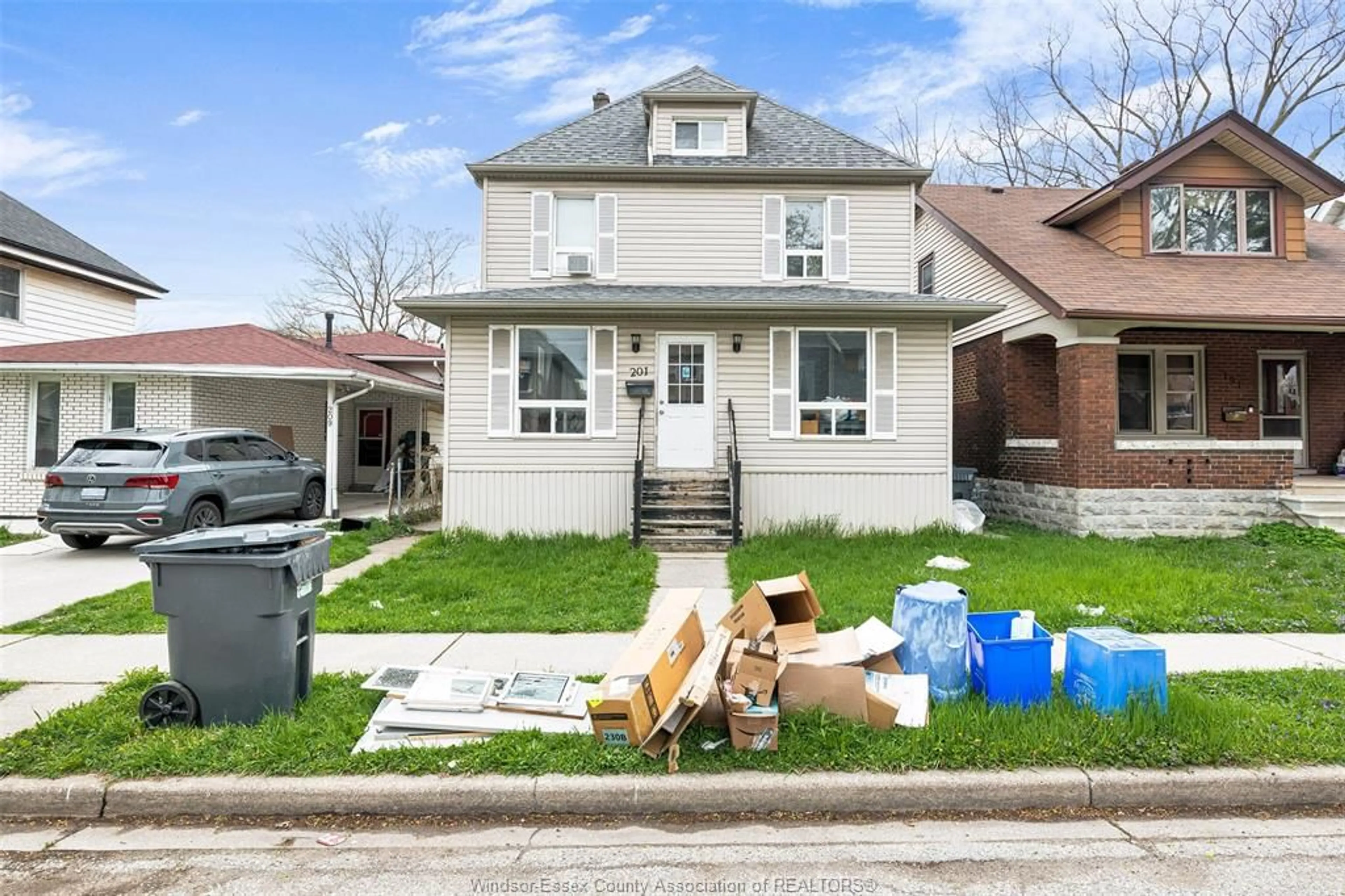 Frontside or backside of a home for 201 BRIDGE Ave, Windsor Ontario N9B 2M1