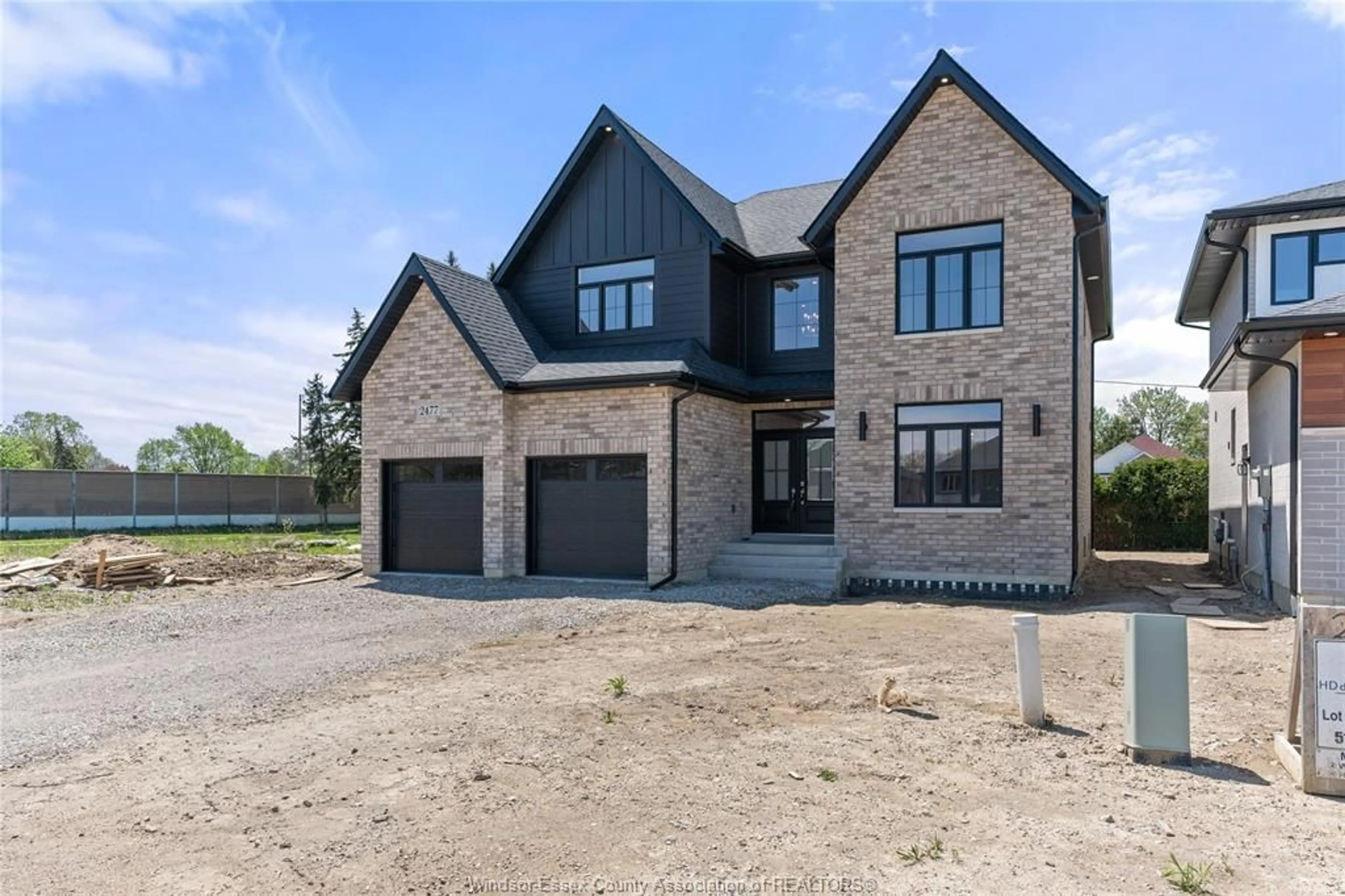 Home with brick exterior material for 2477 PARTINGTON Ave, Windsor Ontario N9E 0A9