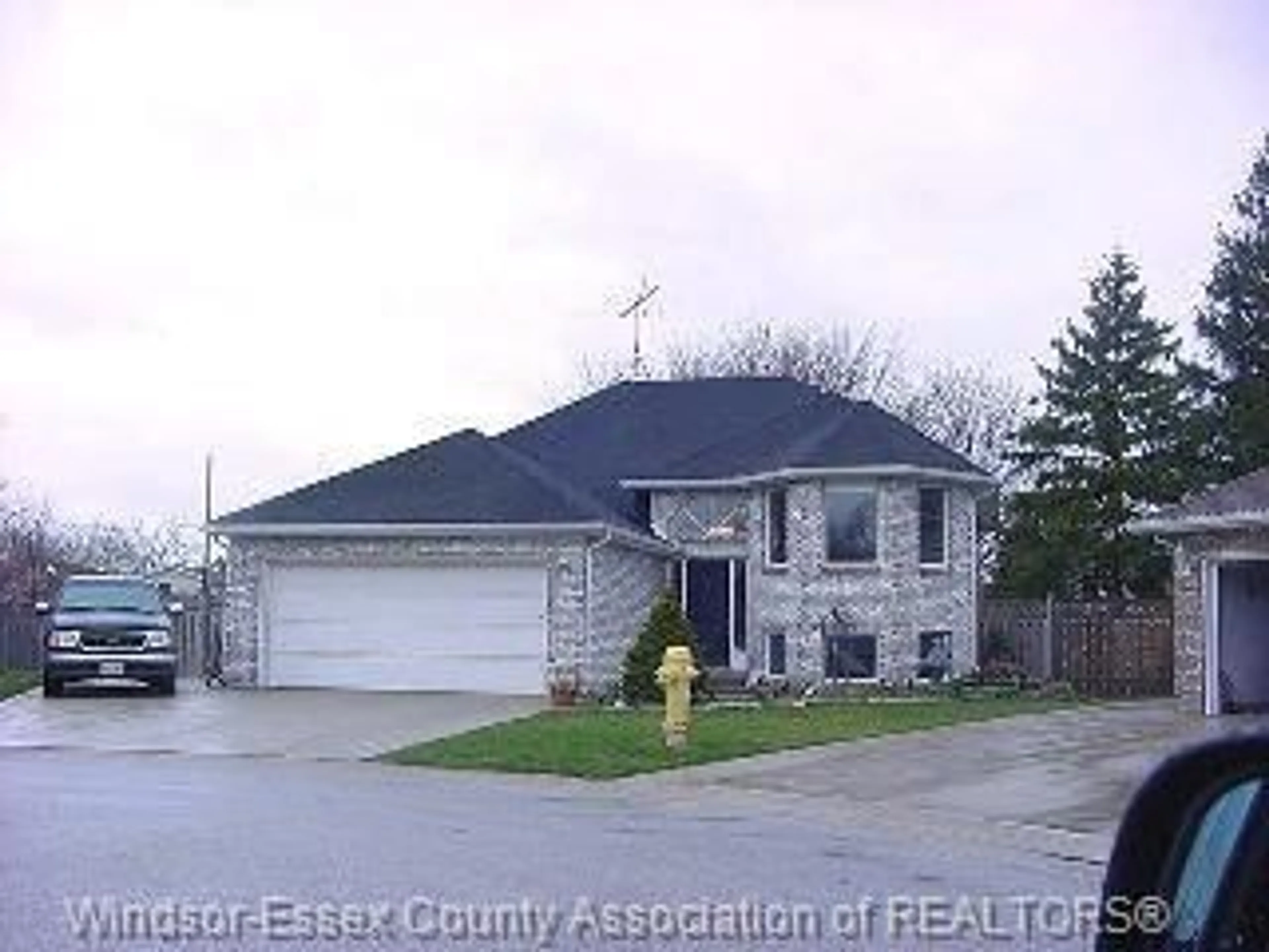 Frontside or backside of a home for 25 TREELINE Crt, Harrow Ontario N0R 1G0