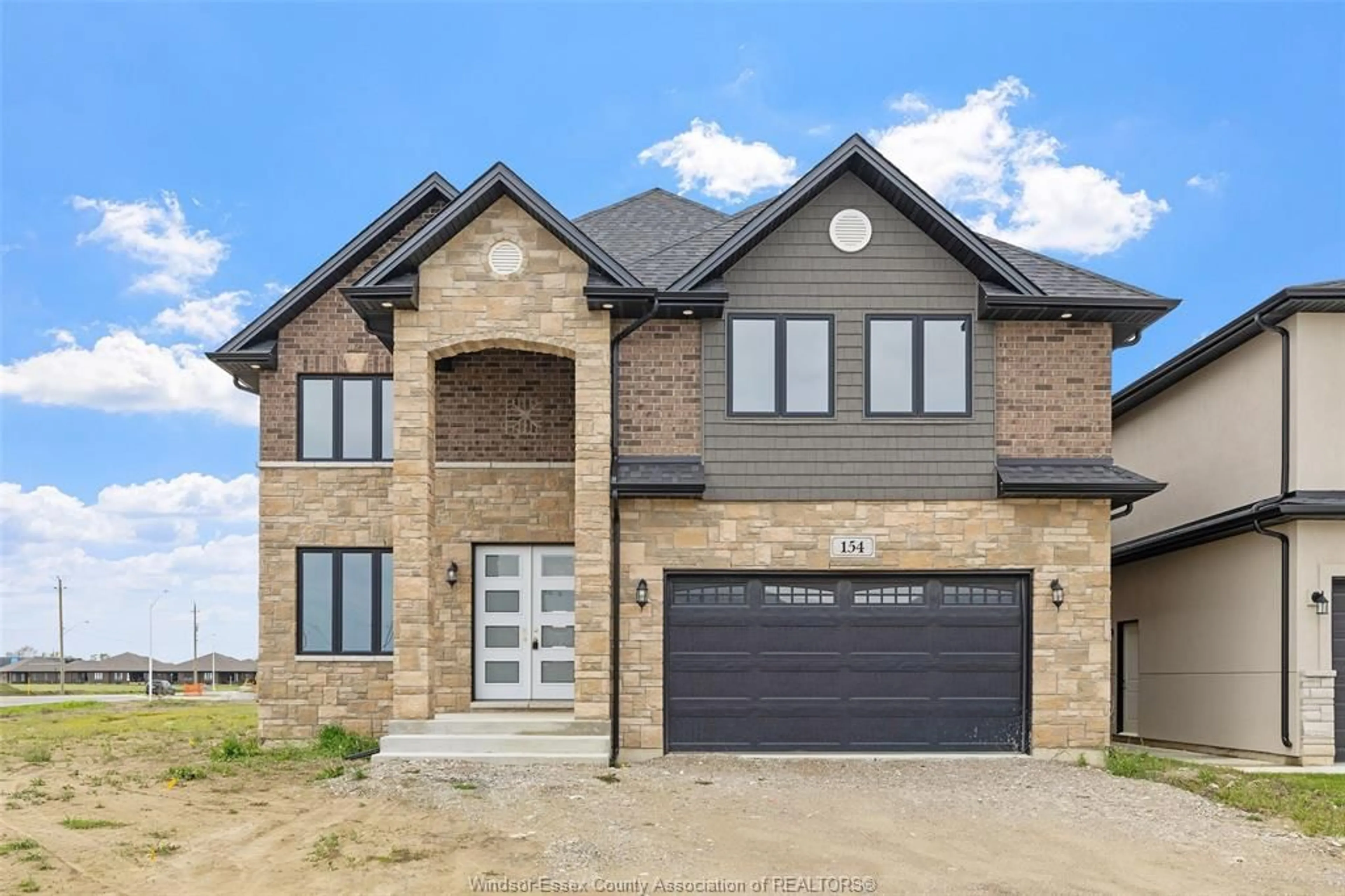 Home with brick exterior material for 154 TUSCANY Trail, Chatham Ontario N7M 6G2