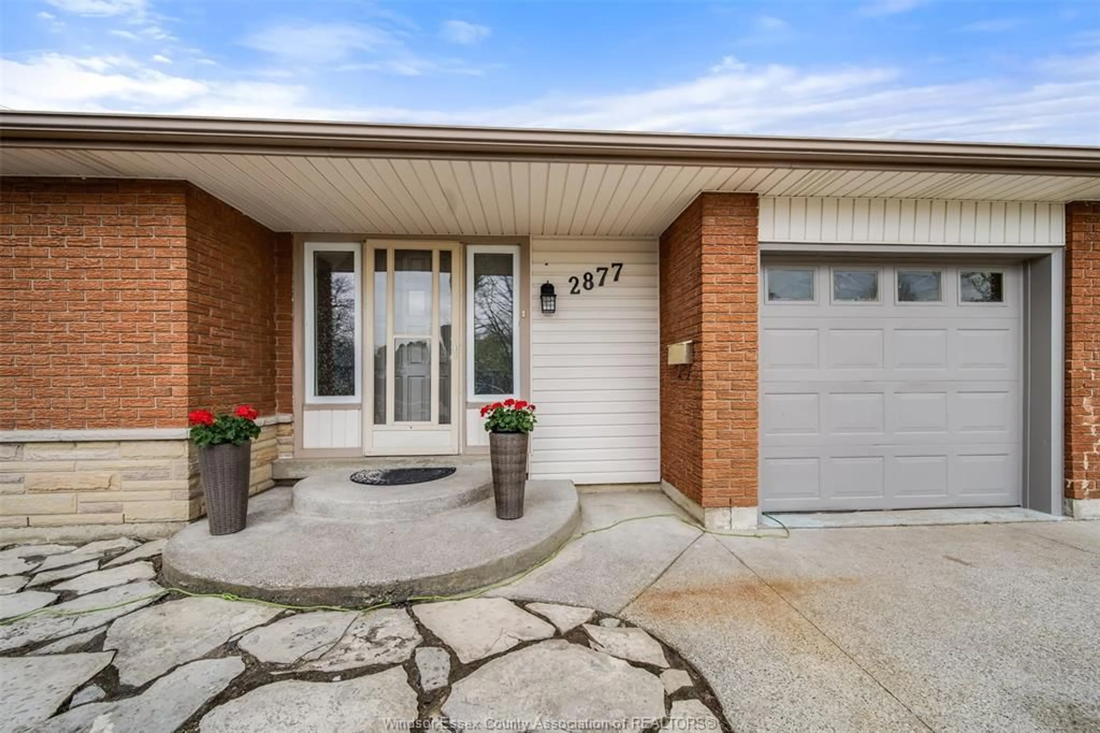 Home with brick exterior material for 2877 FOREST GLADE Dr, Windsor Ontario N8R 1L4