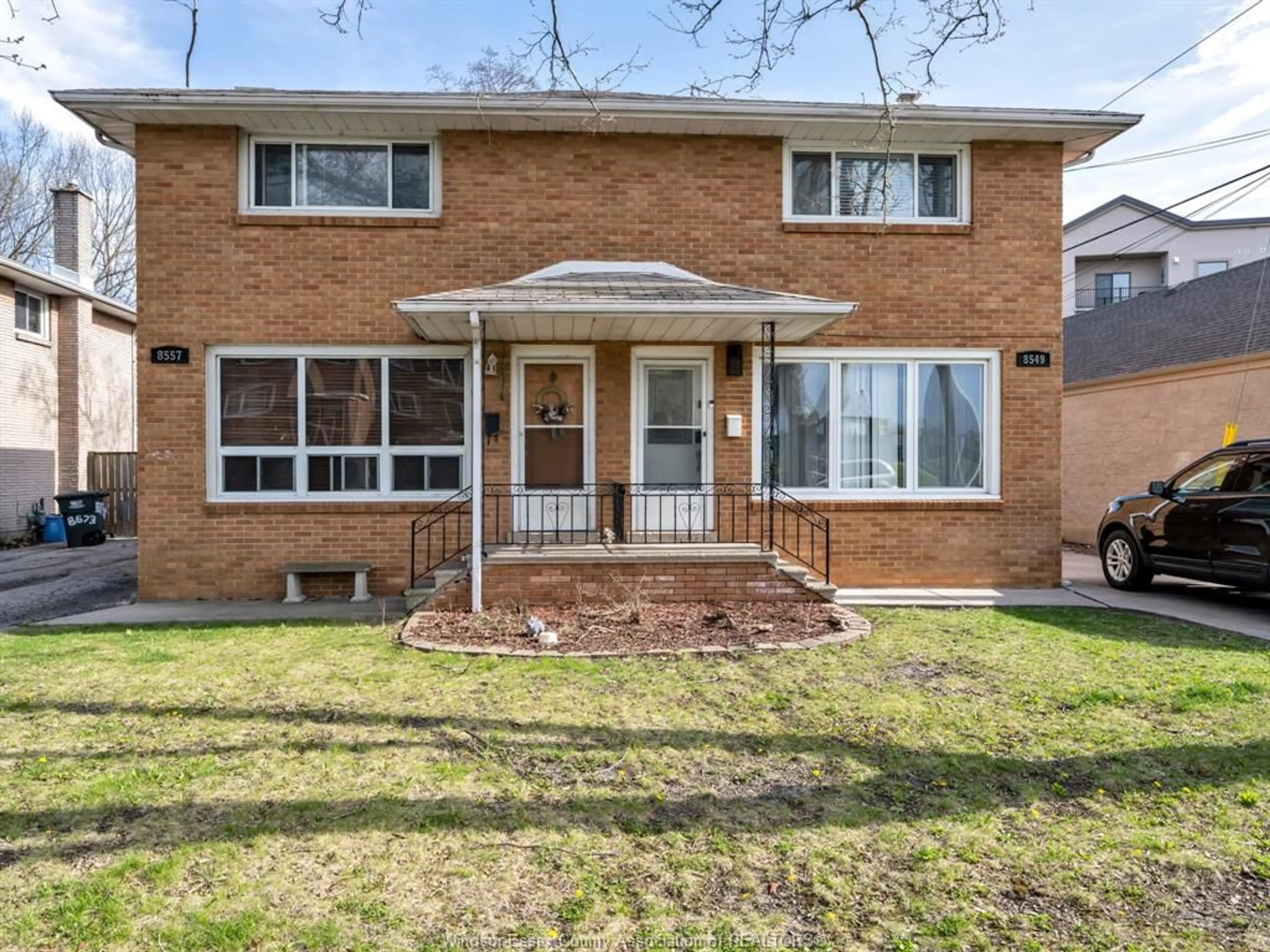 Home with brick exterior material for 8557 WYANDOTTE St, Windsor Ontario N8S 1T7