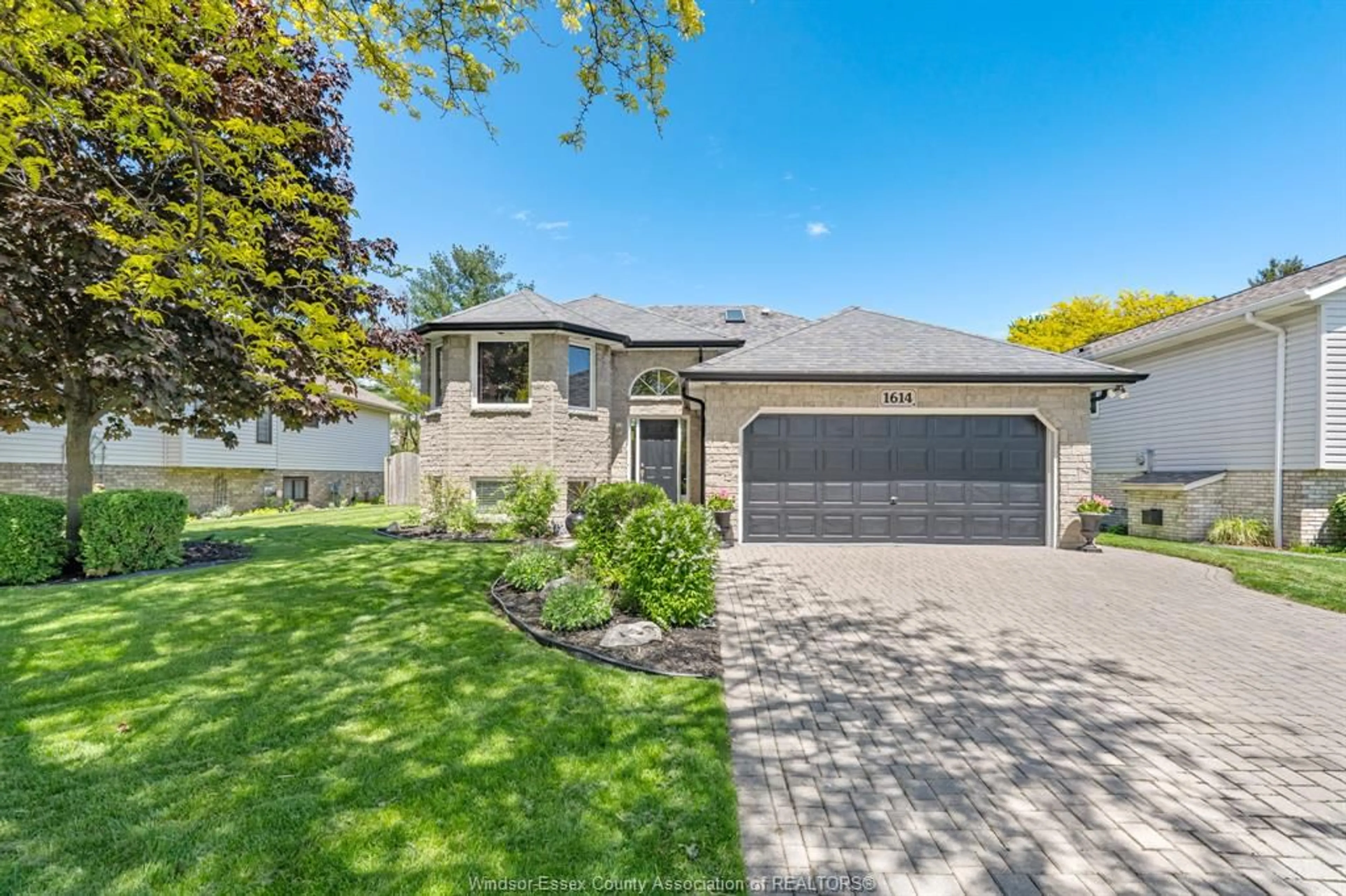 Frontside or backside of a home for 1614 CHERRYWOOD Dr, Lakeshore Ontario N0R 1A0