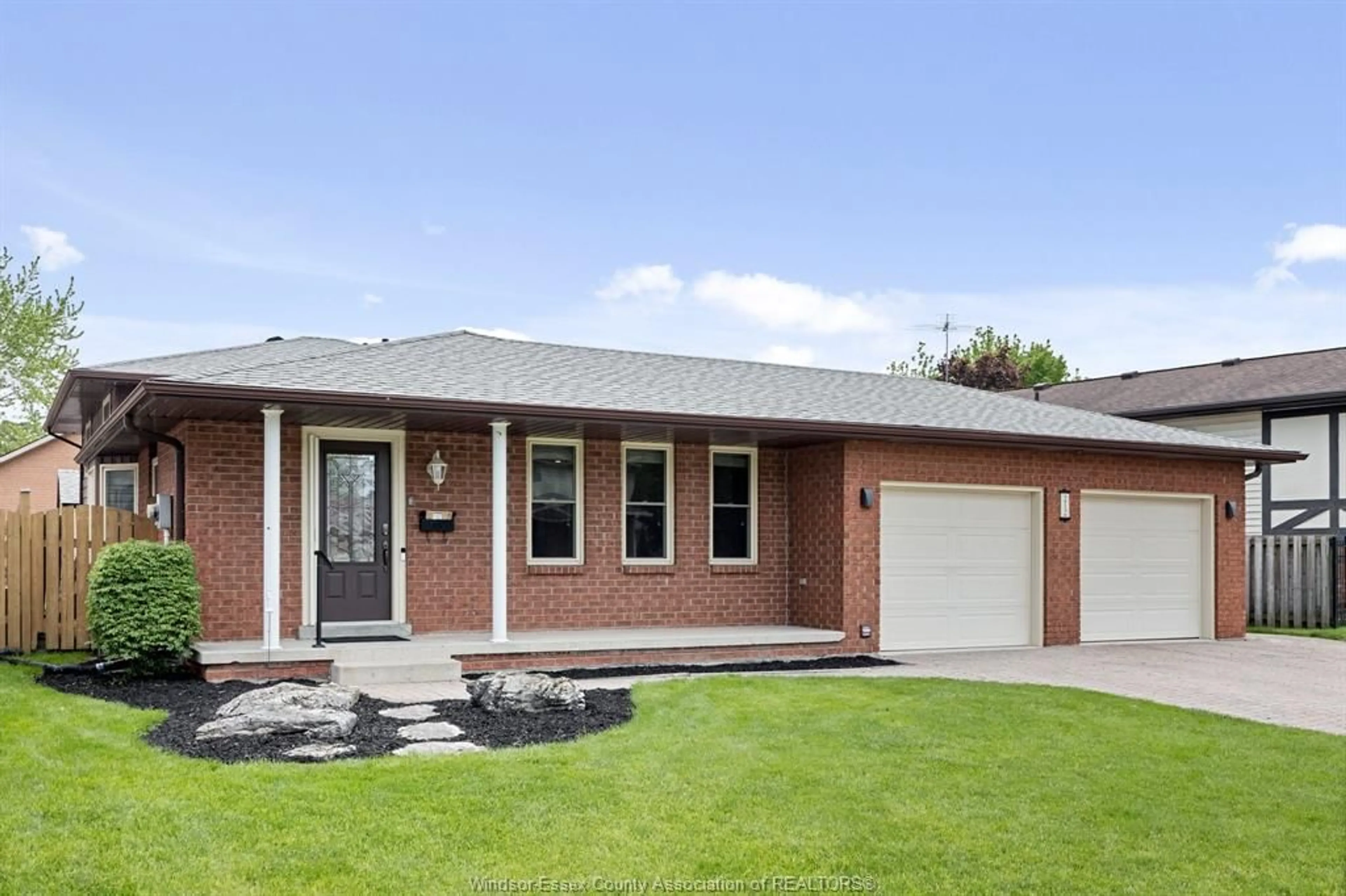 Home with brick exterior material for 212 WEDGEWOOD Lane, Tecumseh Ontario N8N 4J5