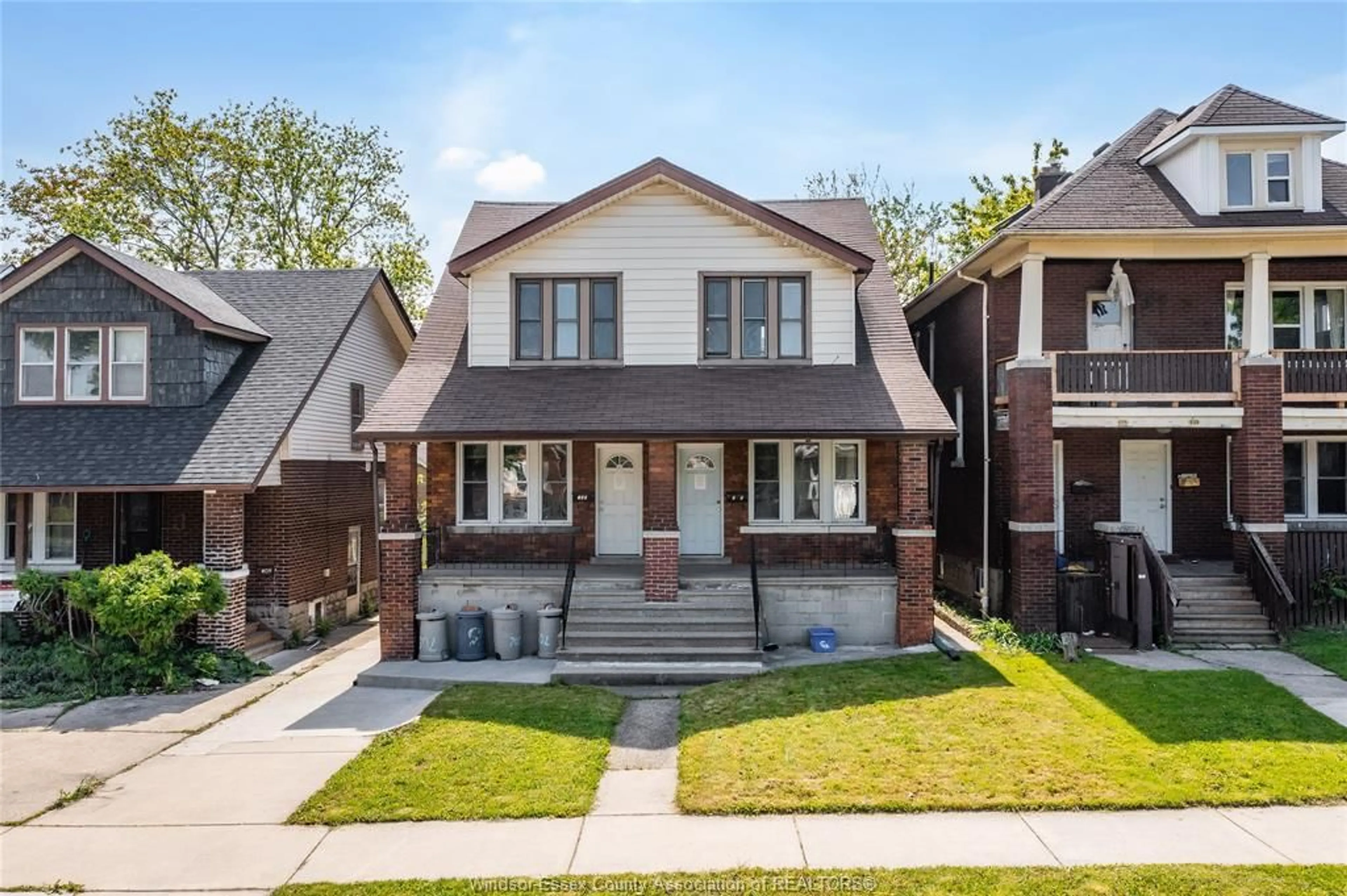 Home with brick exterior material for 703-705 PARTINGTON Ave, Windsor Ontario N9B 2N6