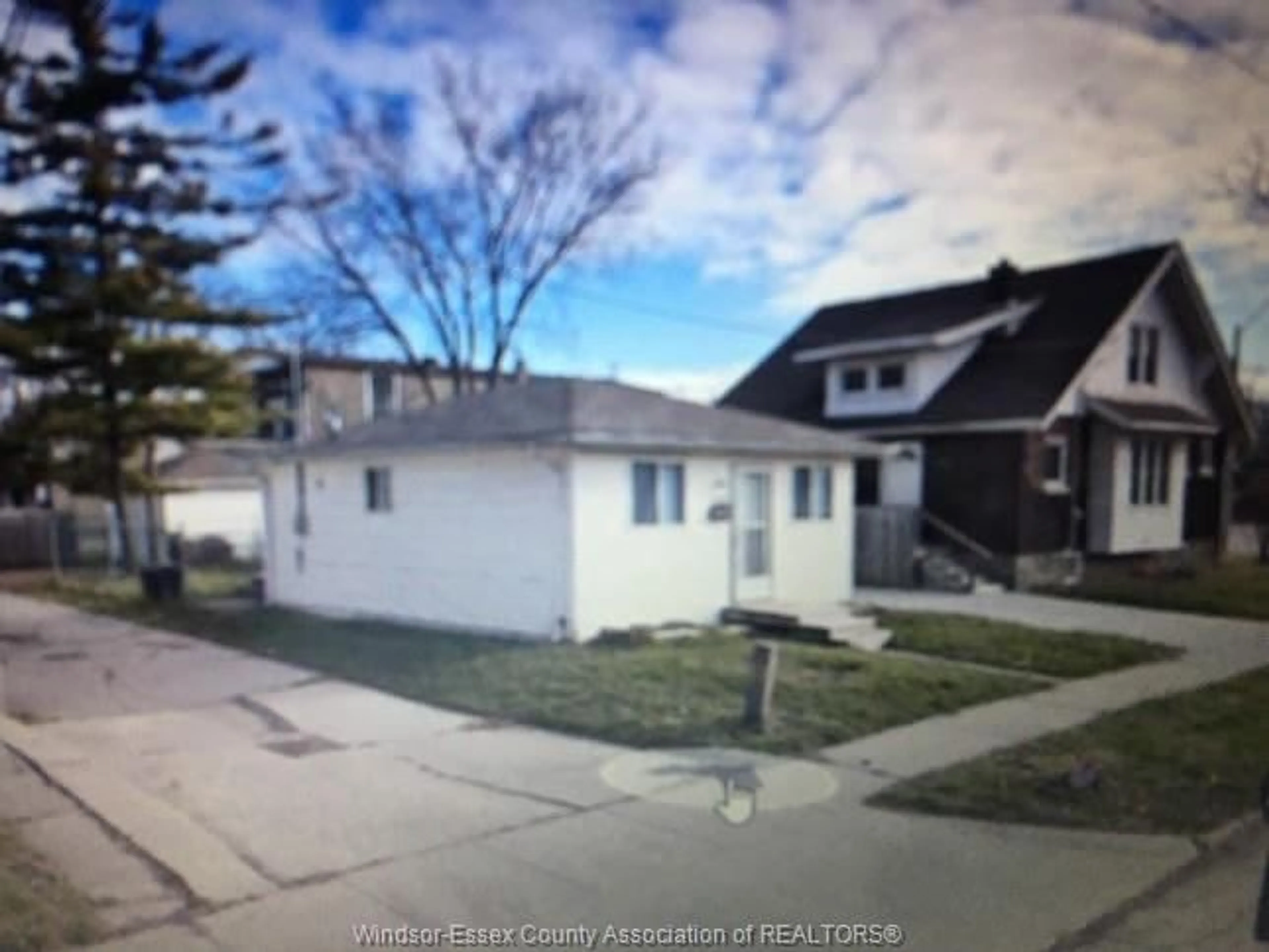 Frontside or backside of a home for 426 TECUMSEH Rd #LOT 147, Windsor Ontario N8X 1G5