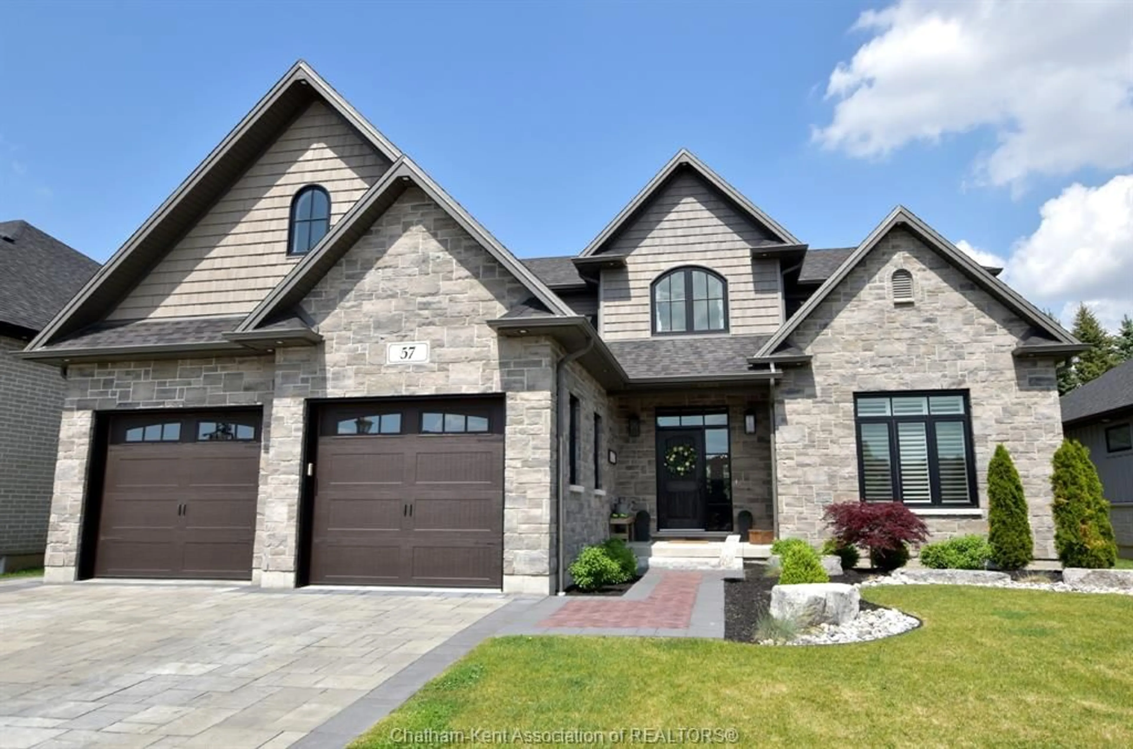 Home with brick exterior material for 57 Tuscany Trail, Chatham Ontario N0P1N0