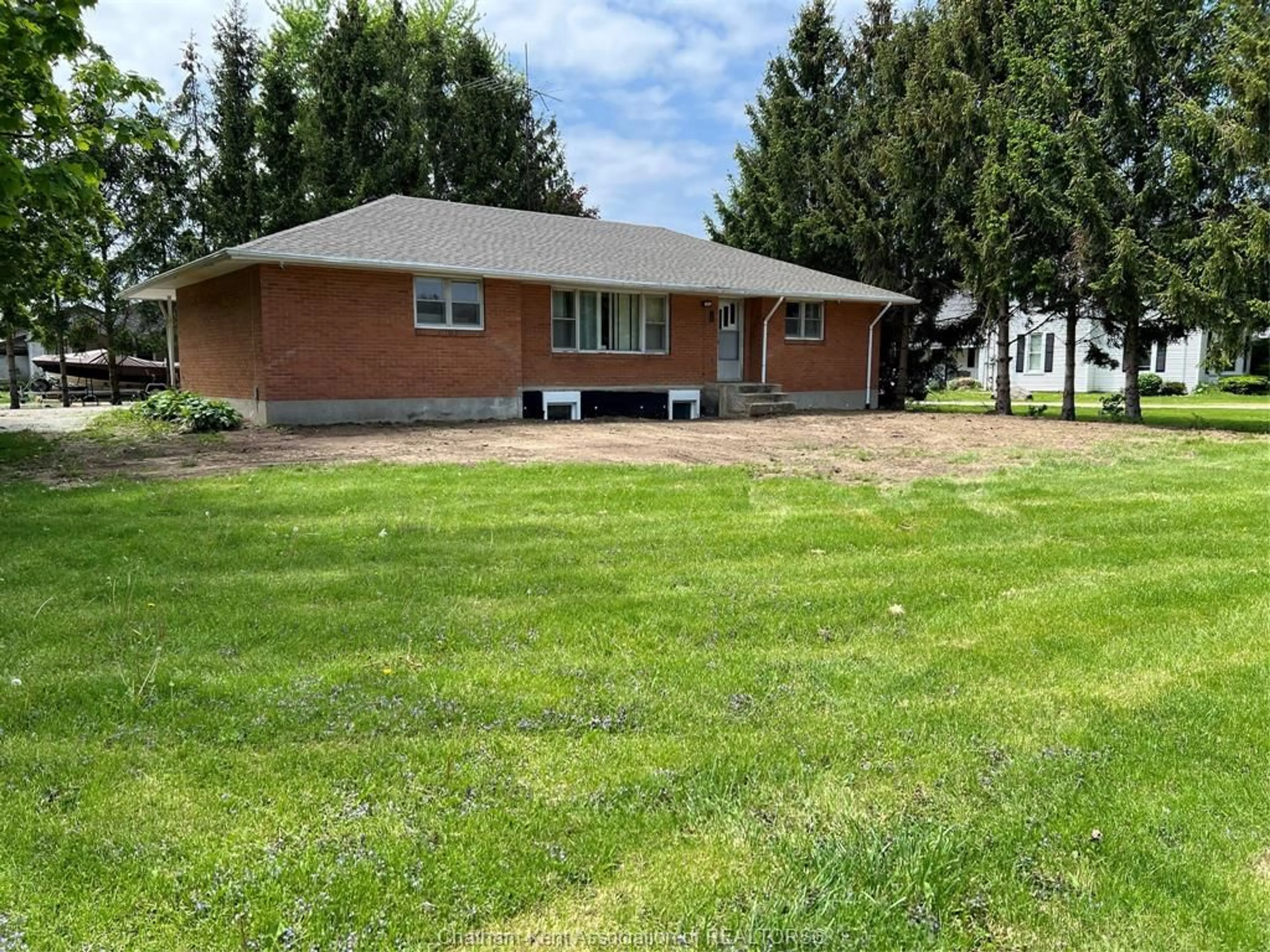 Frontside or backside of a home for 12559 JOHN St, Chatham-Kent Ontario N0P 1X0