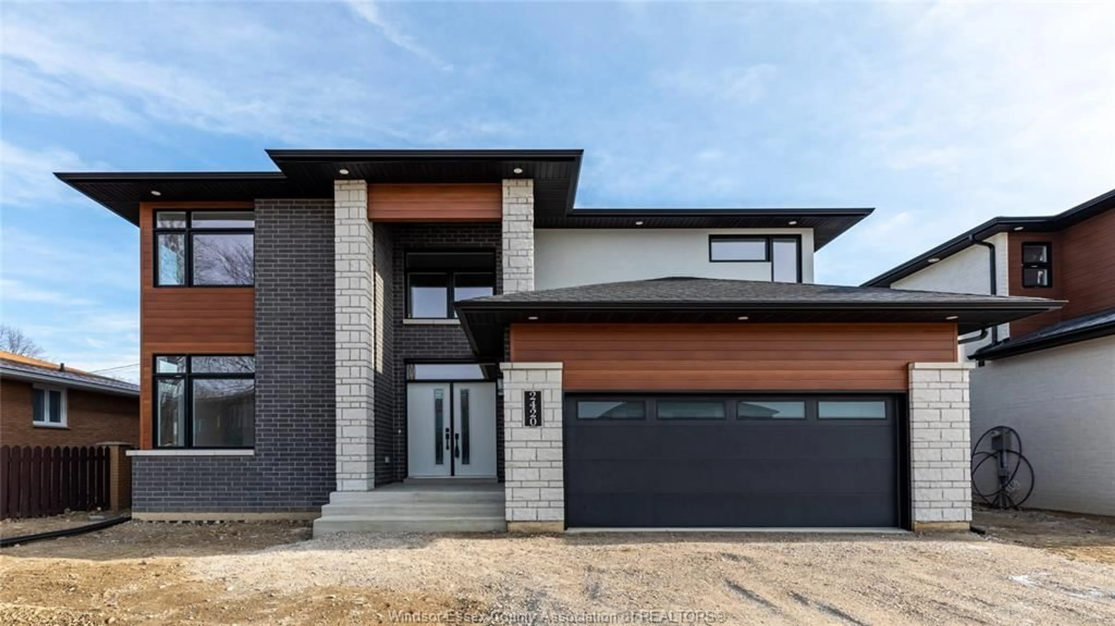 Home with brick exterior material for 2420 Roxborough, Windsor Ontario N9E 2Z8
