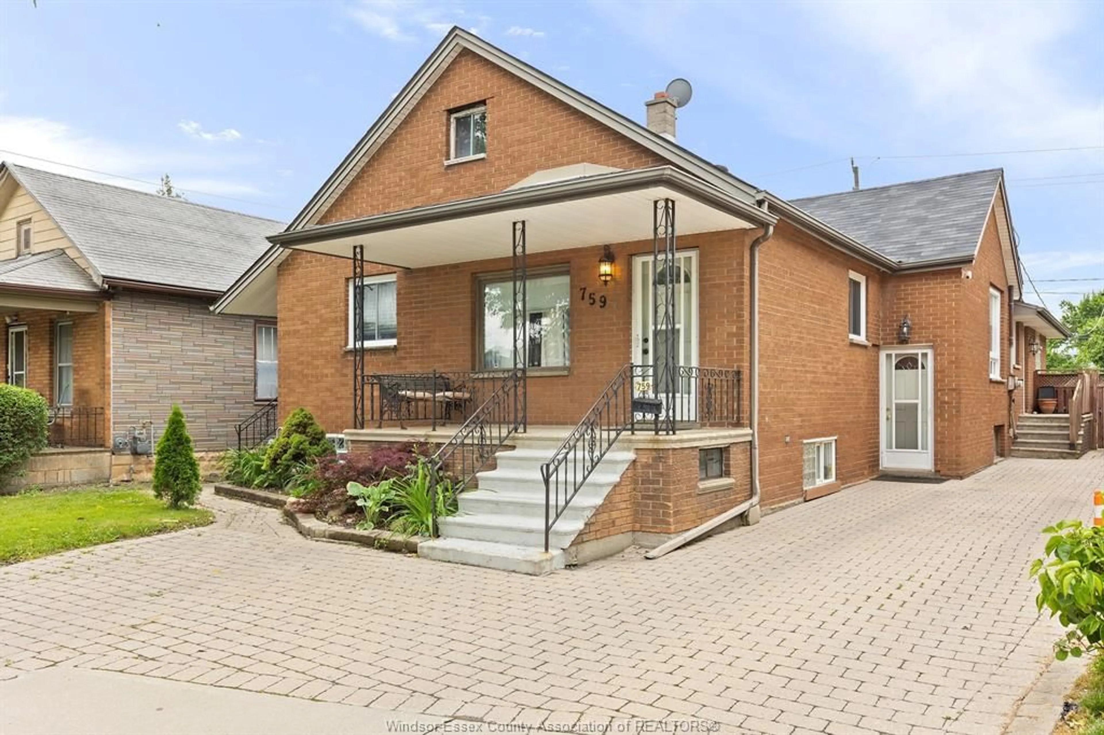 Home with brick exterior material for 759 GLENGARRY Ave, Windsor Ontario N9A 1R4