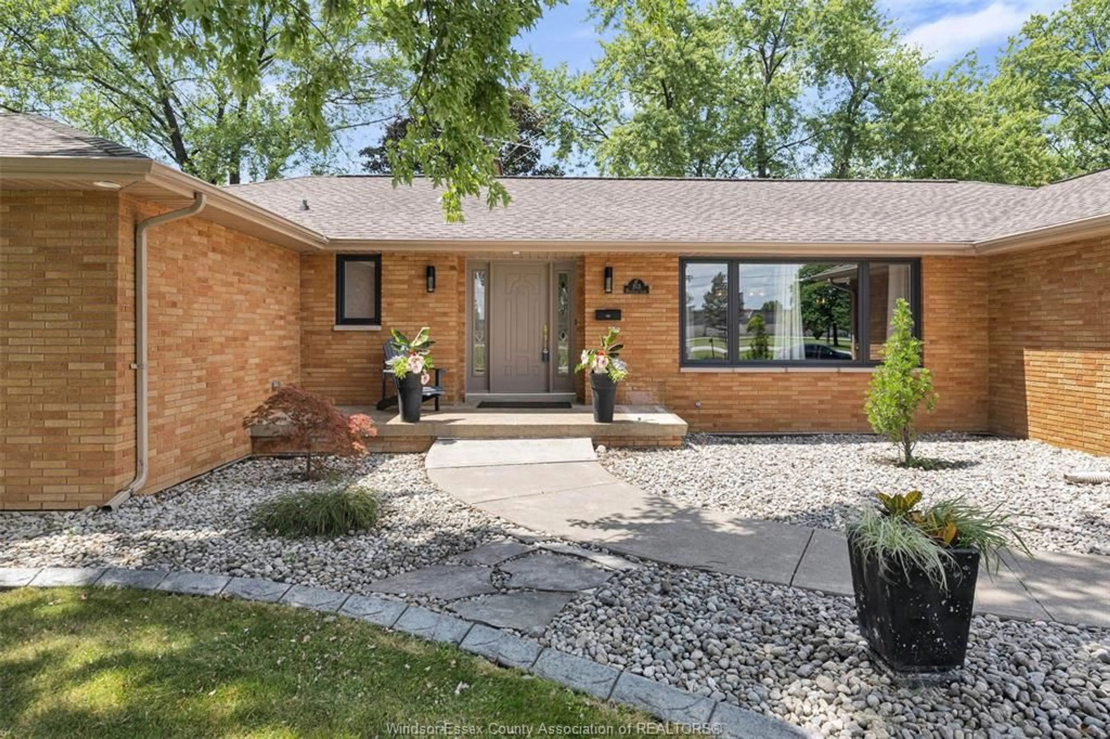 Home with brick exterior material for 103 BUCKWHEAT Lane, Lakeshore Ontario N8N 3S2