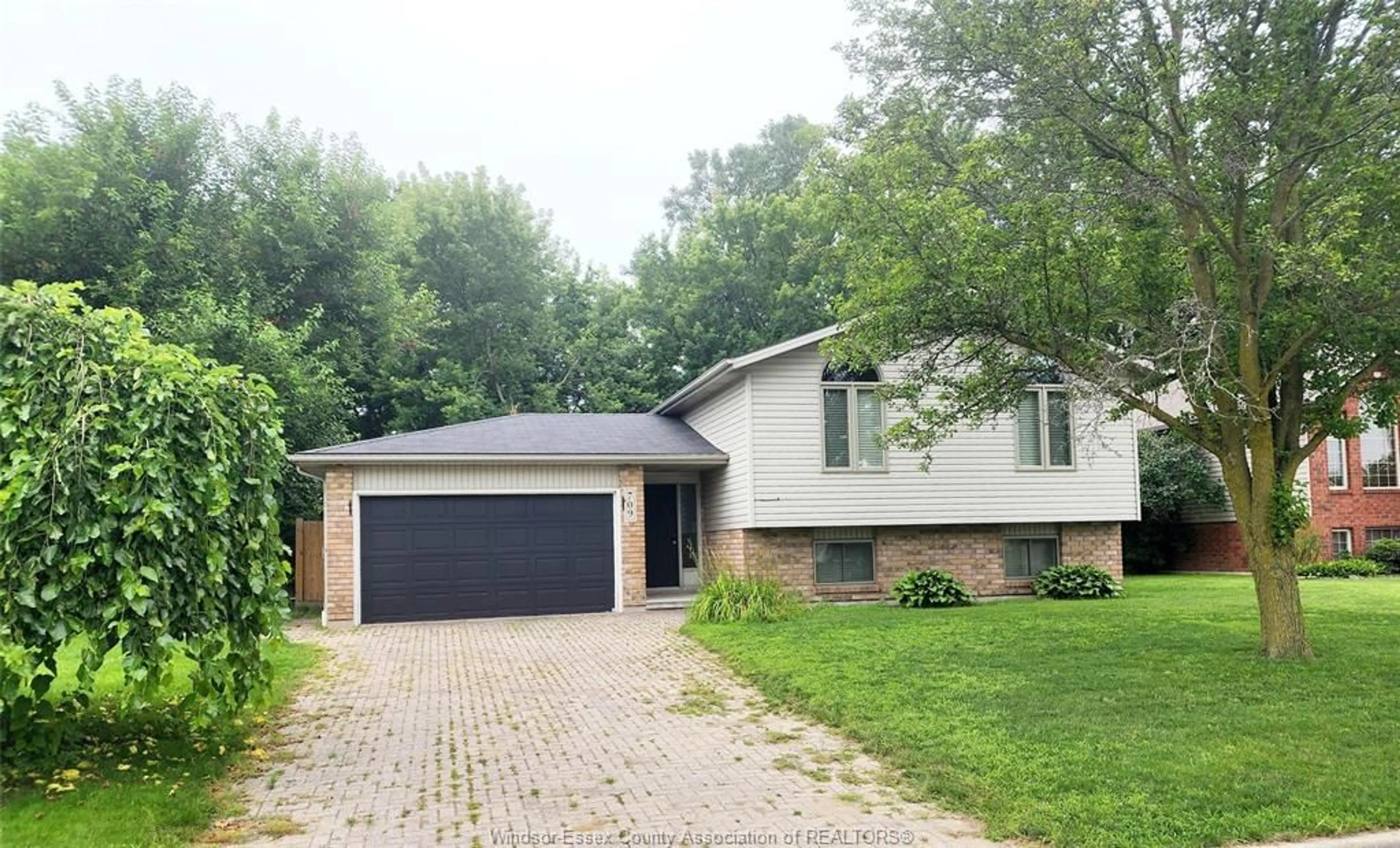 Home with brick exterior material for 709 RIVER Ave, LaSalle Ontario N9J 3K9