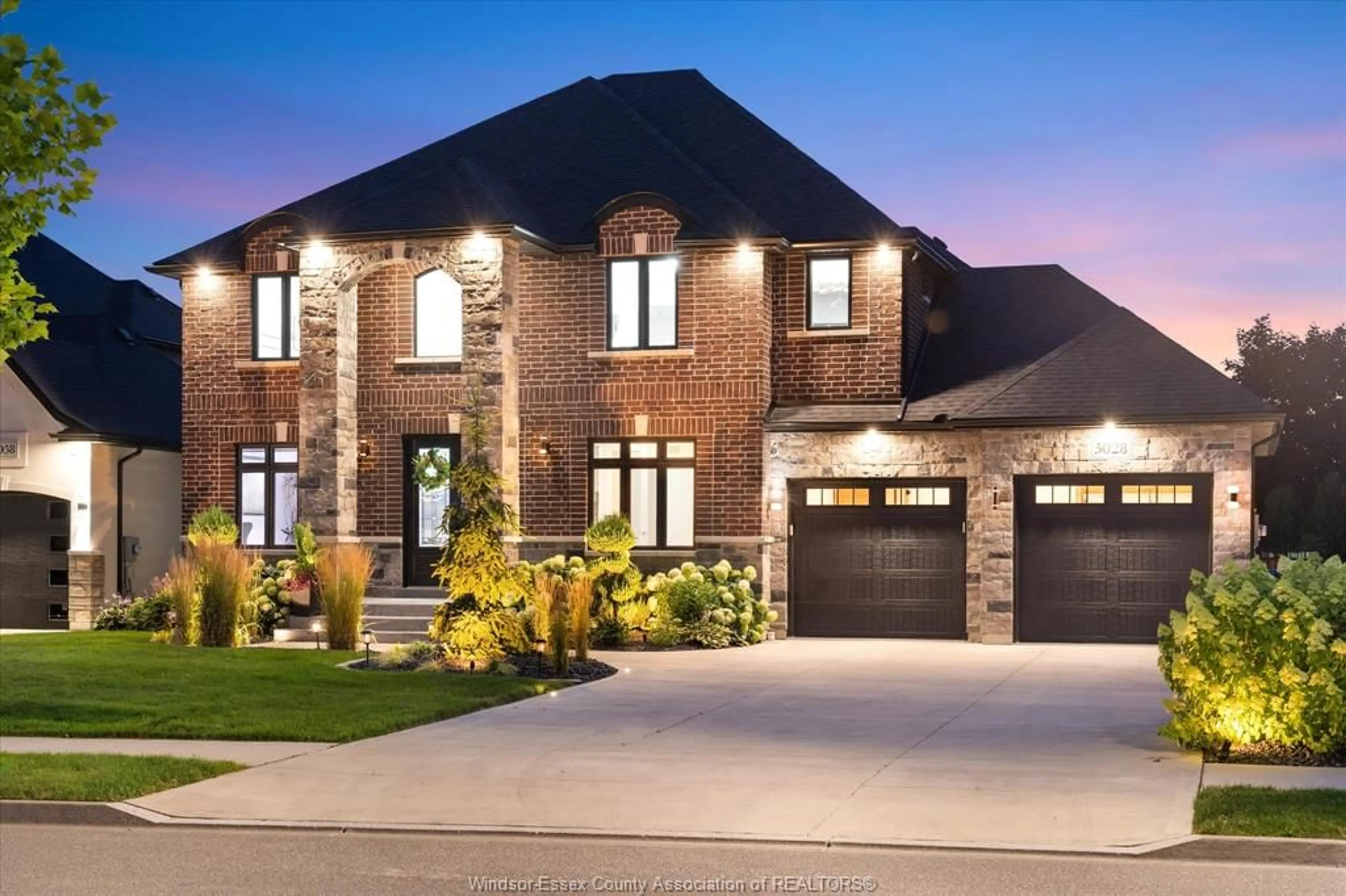 Home with brick exterior material for 5028 WHISPERING PINES Cres, LaSalle Ontario N9H 0E5