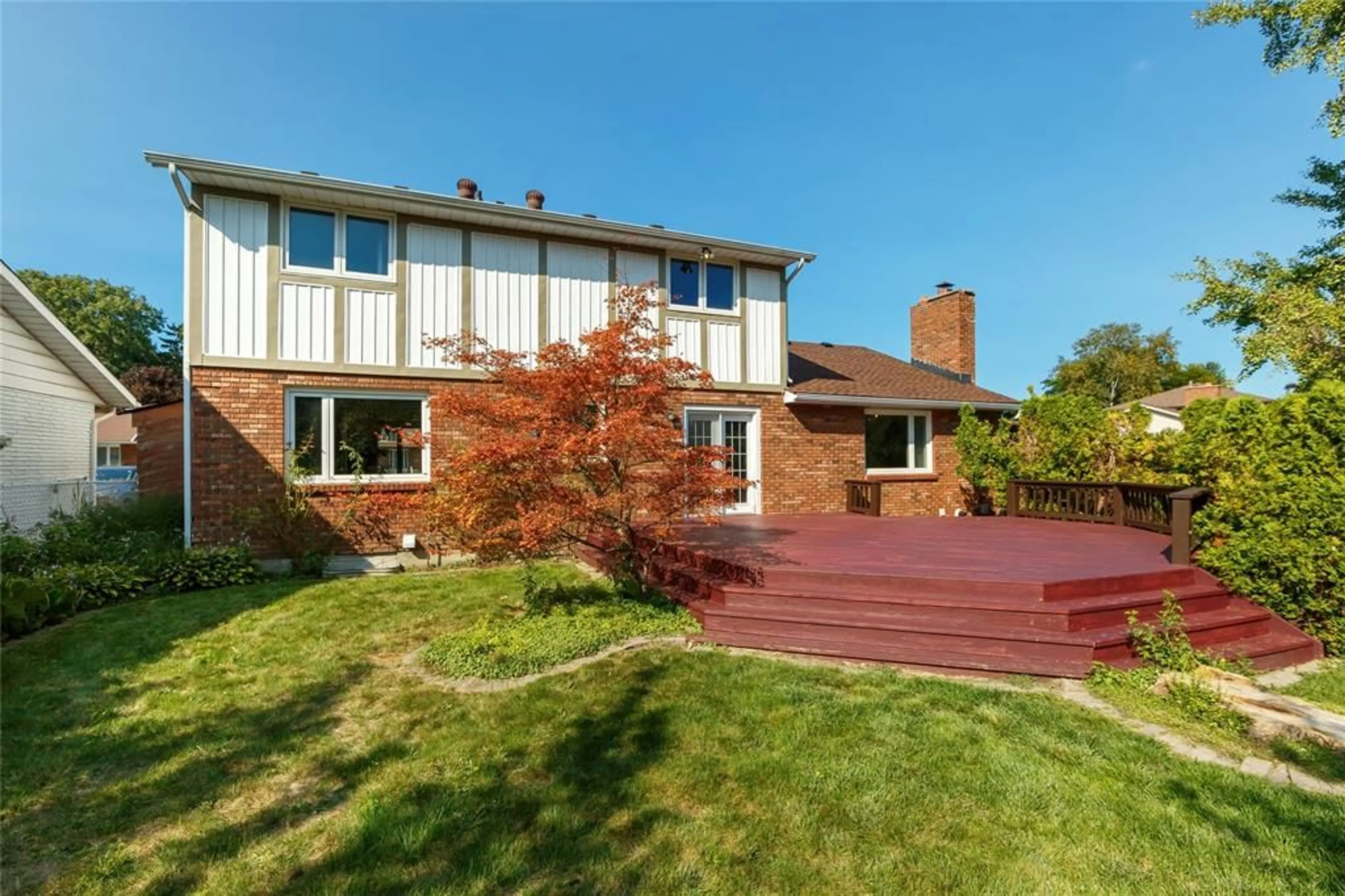 Frontside or backside of a home, the fenced backyard for 198 TWIN LAKES Dr, Sarnia Ontario N7S4X5