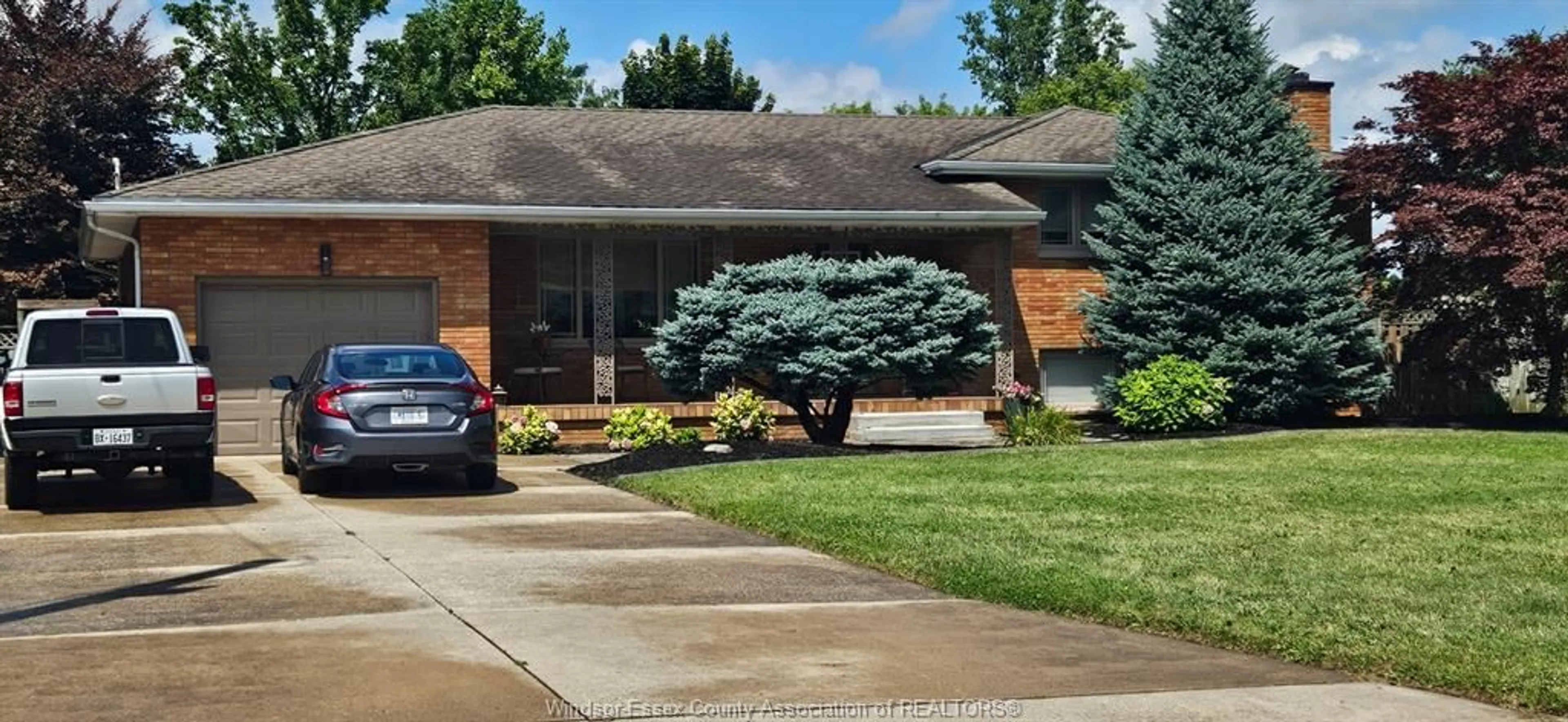 Frontside or backside of a home, the street view for 1900 OMIRA, LaSalle Ontario N9H 1R2