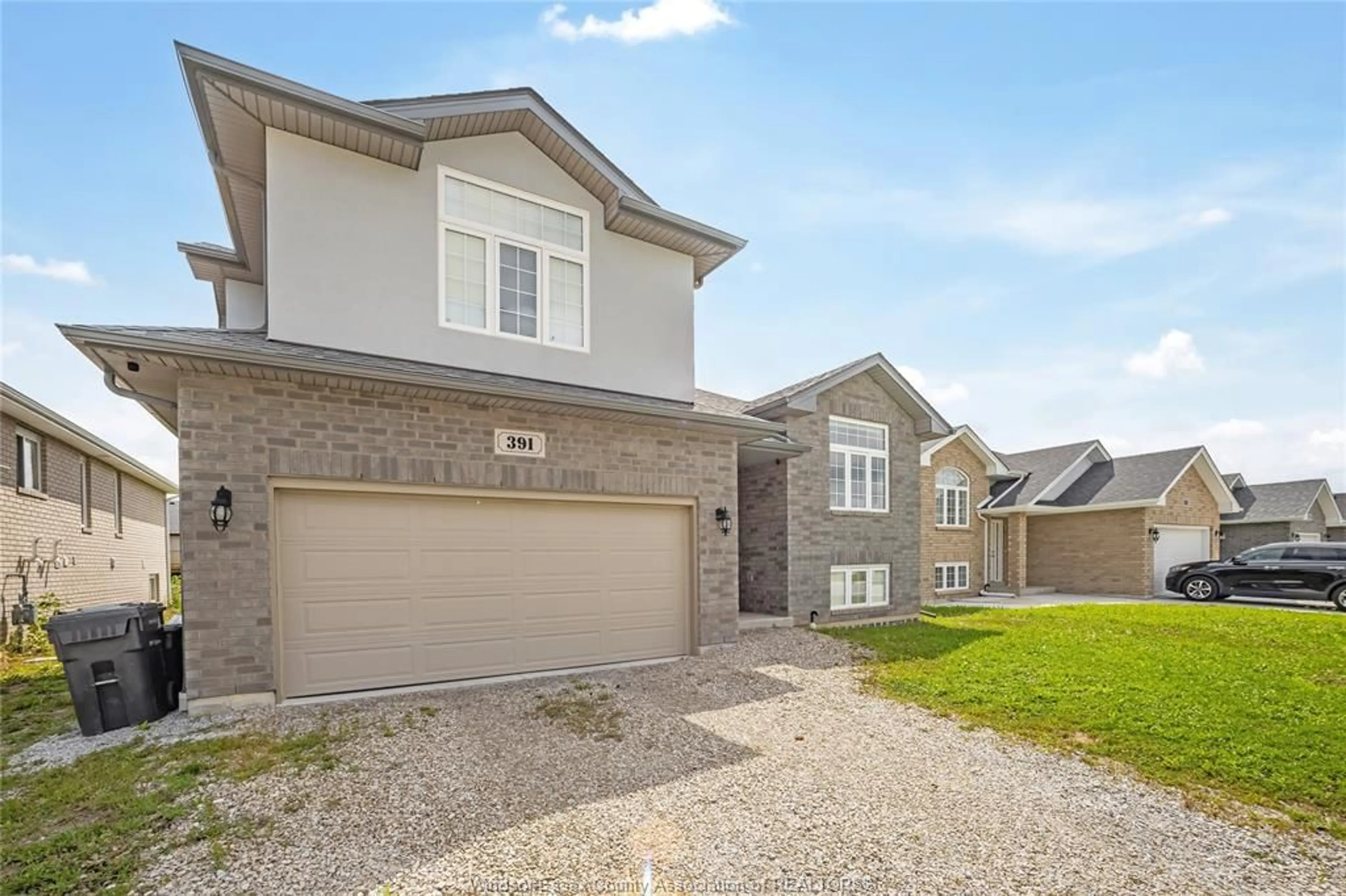 Frontside or backside of a home for 391 CYPRESS Lane, Lakeshore Ontario N0R 1A0