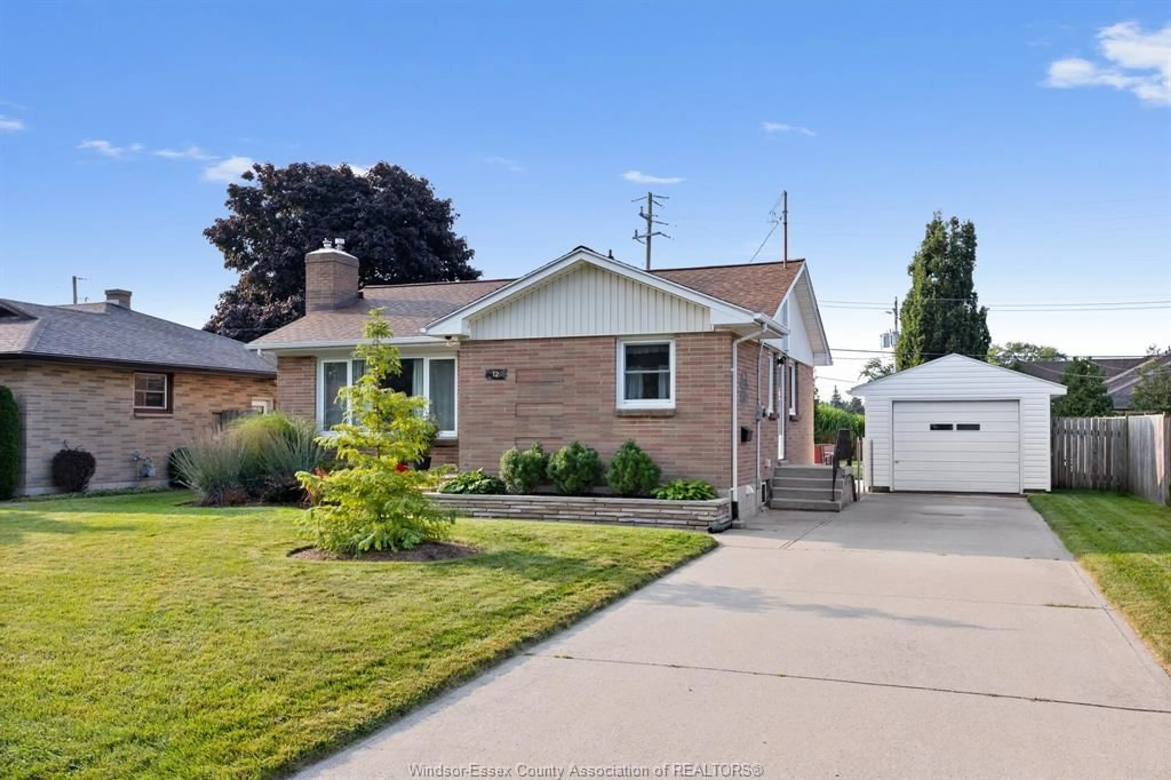 Frontside or backside of a home, the street view for 12 PULFORD Ave, Leamington Ontario N8H 2J3