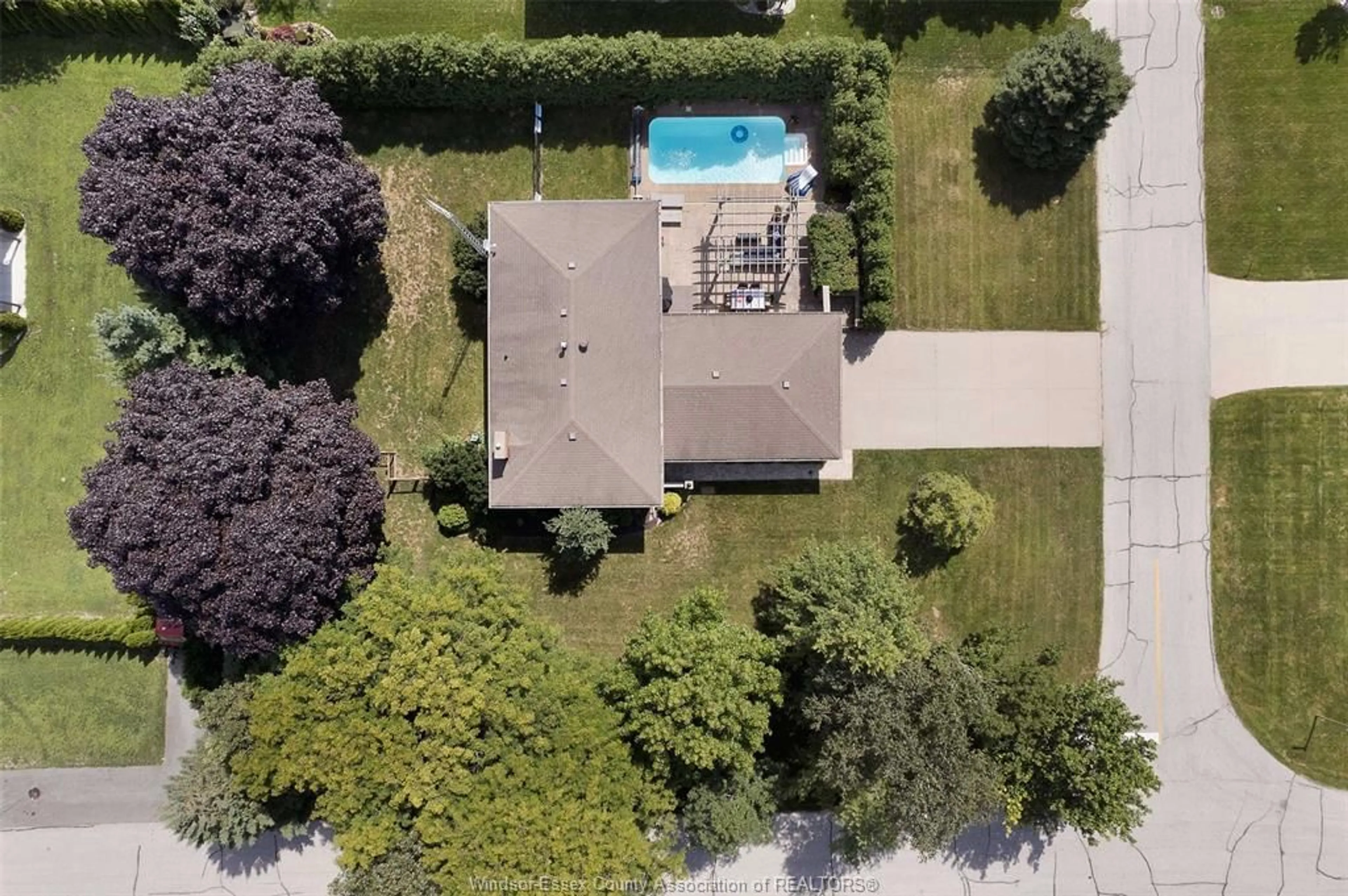 Frontside or backside of a home, the fenced backyard for 10 KENNETH Dr, Leamington Ontario N8H 4B3