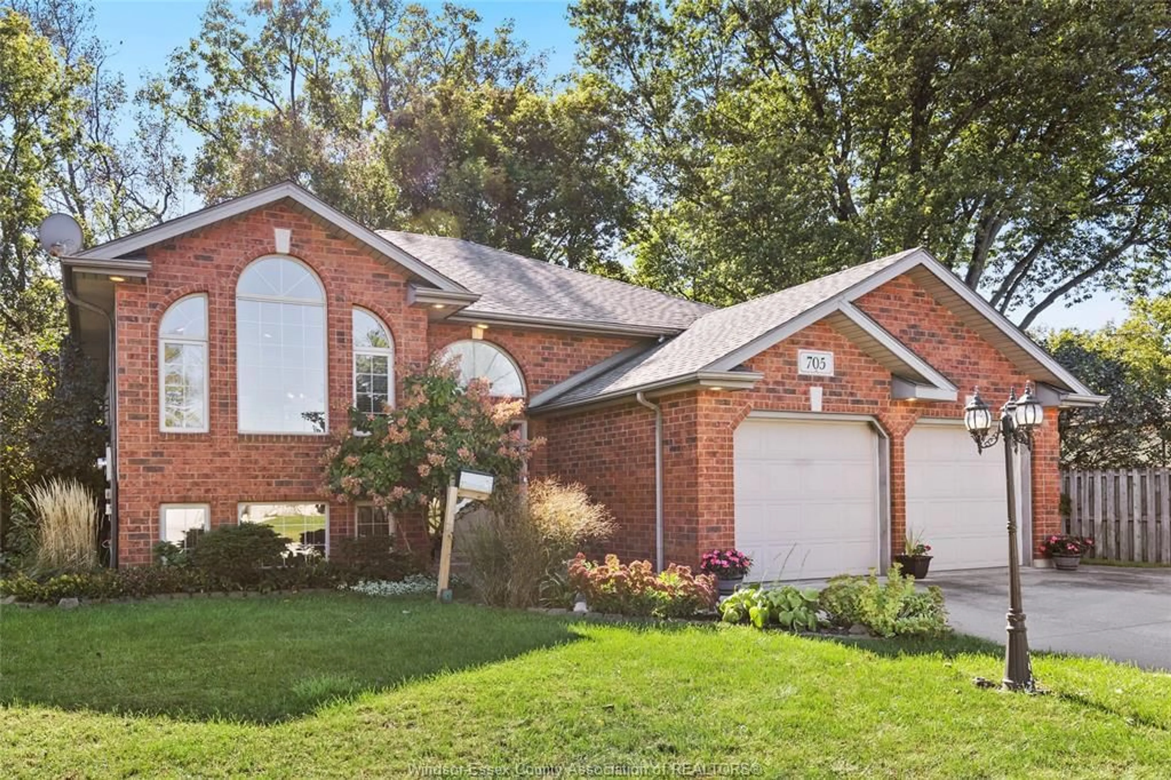 Home with brick exterior material for 705 RIVER Ave, LaSalle Ontario N9J 3K9