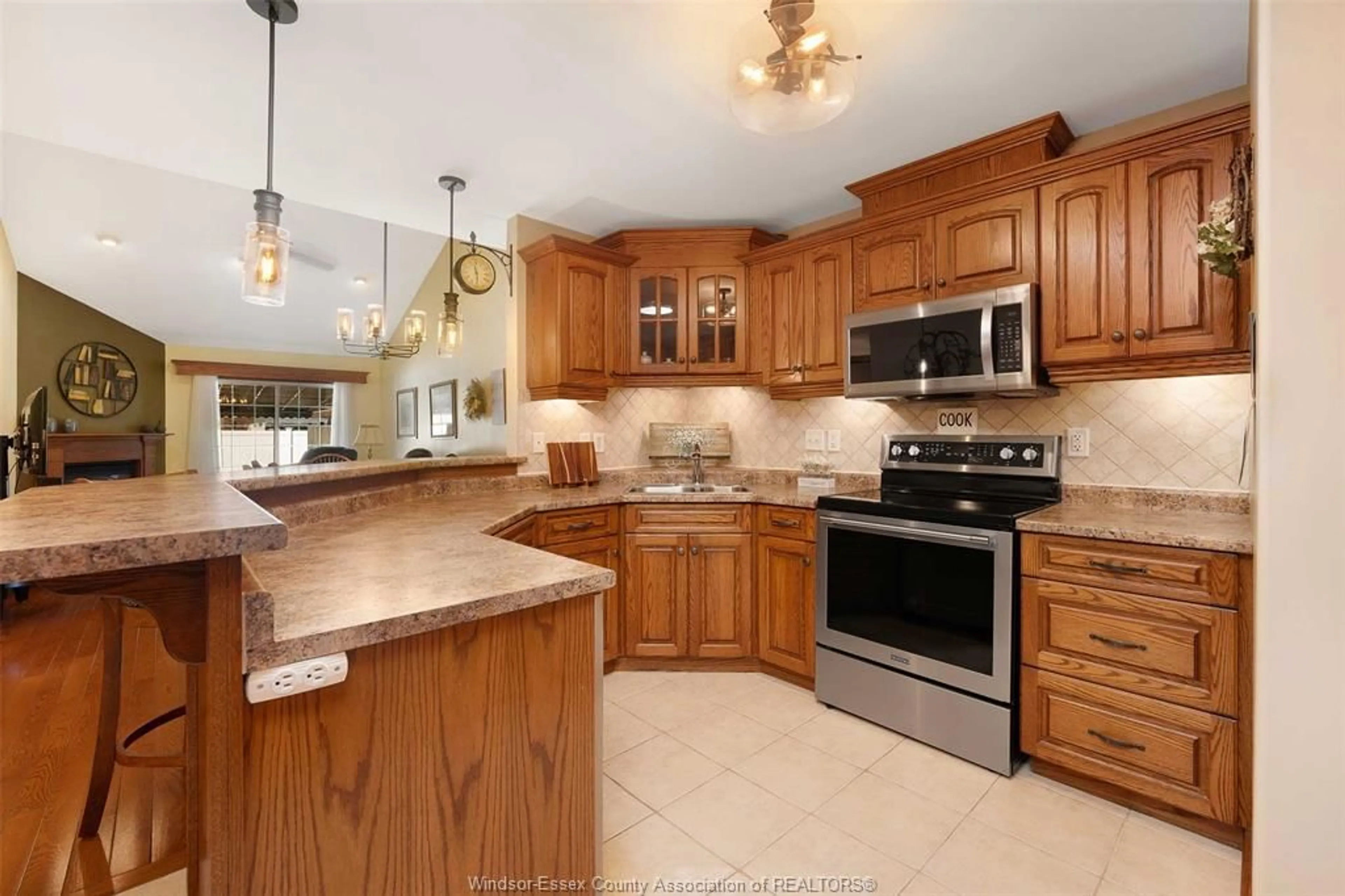 Open concept kitchen, ceramic/tile floor for 400 Millstone Lane, Belle River Ontario N8L 0P4