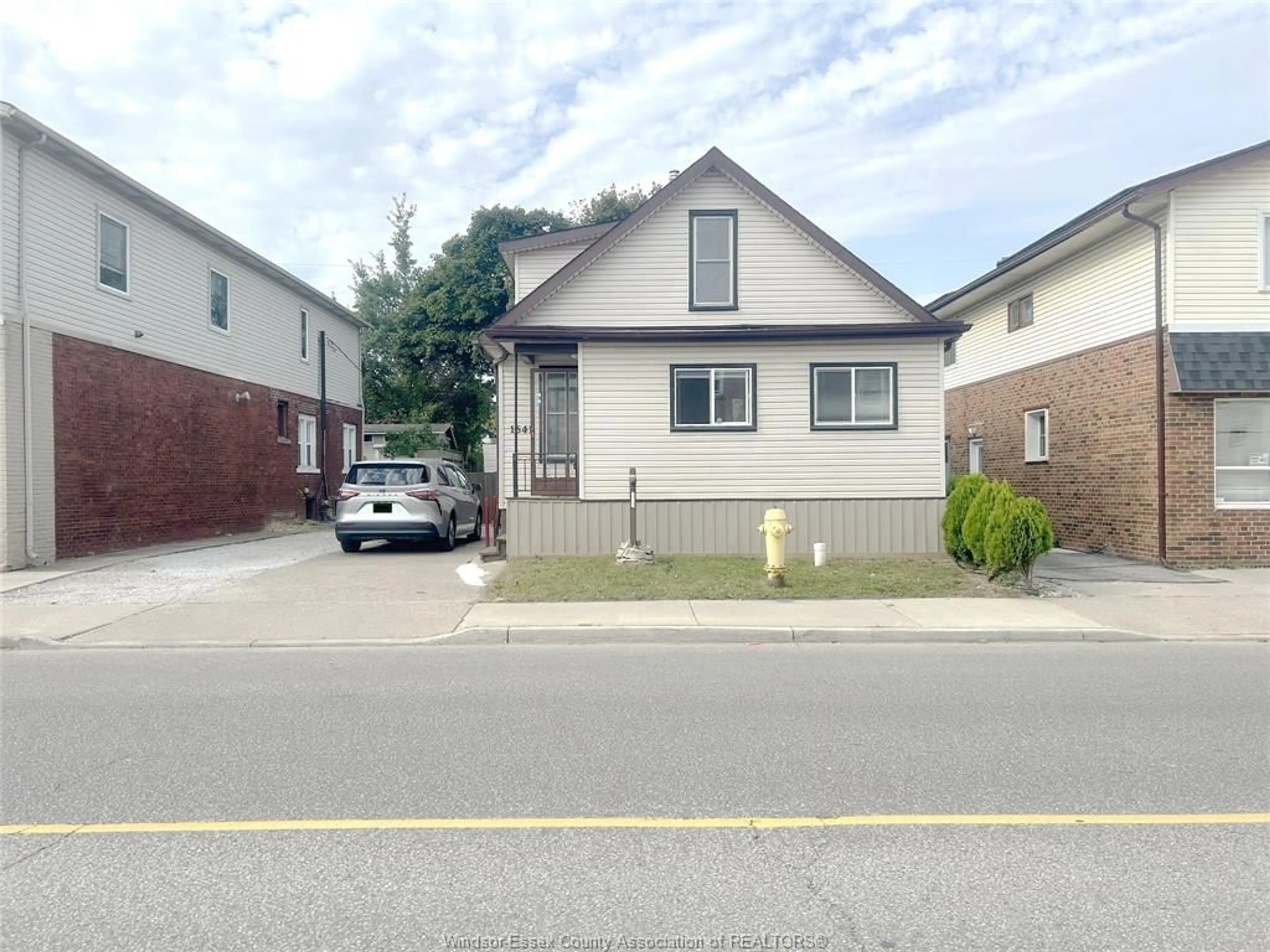 Frontside or backside of a home, the street view for 1641 Drouillard Rd, Windsor Ontario N8Y 2S4