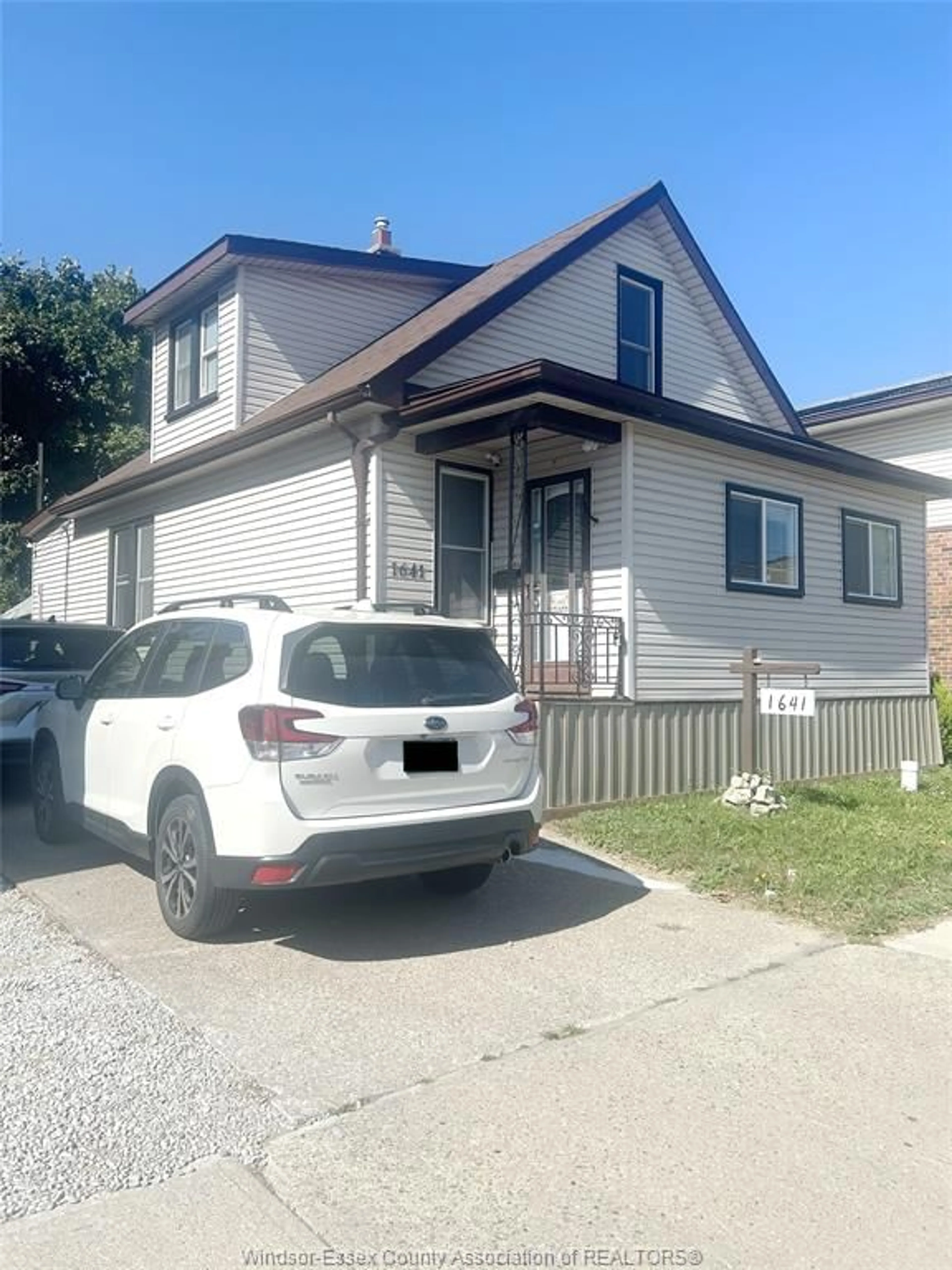 Frontside or backside of a home, the street view for 1641 Drouillard Rd, Windsor Ontario N8Y 2S4