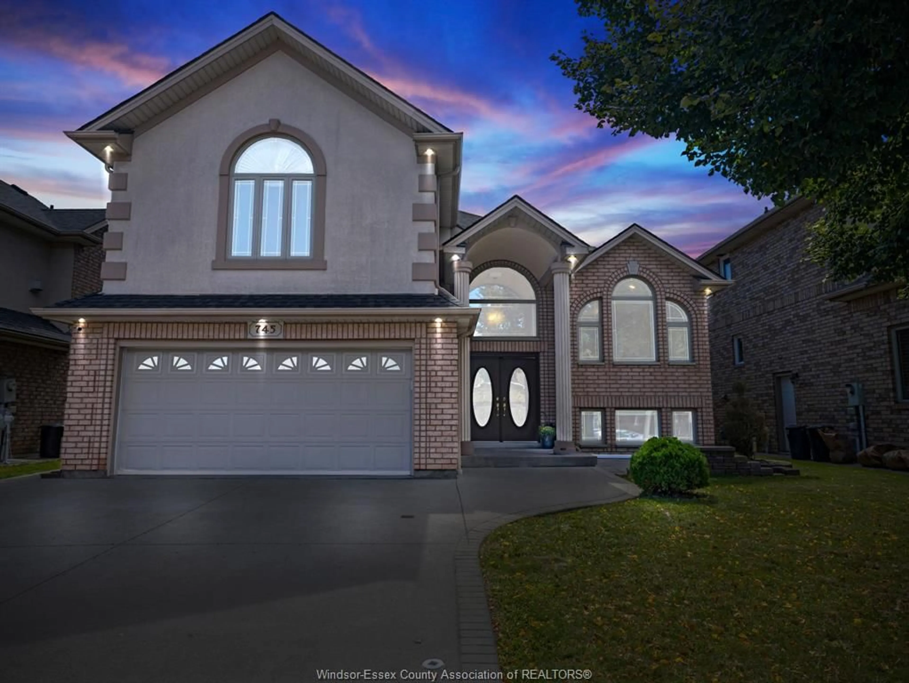 Frontside or backside of a home, the street view for 745 Massimo Cres, Windsor Ontario N9G 3C7