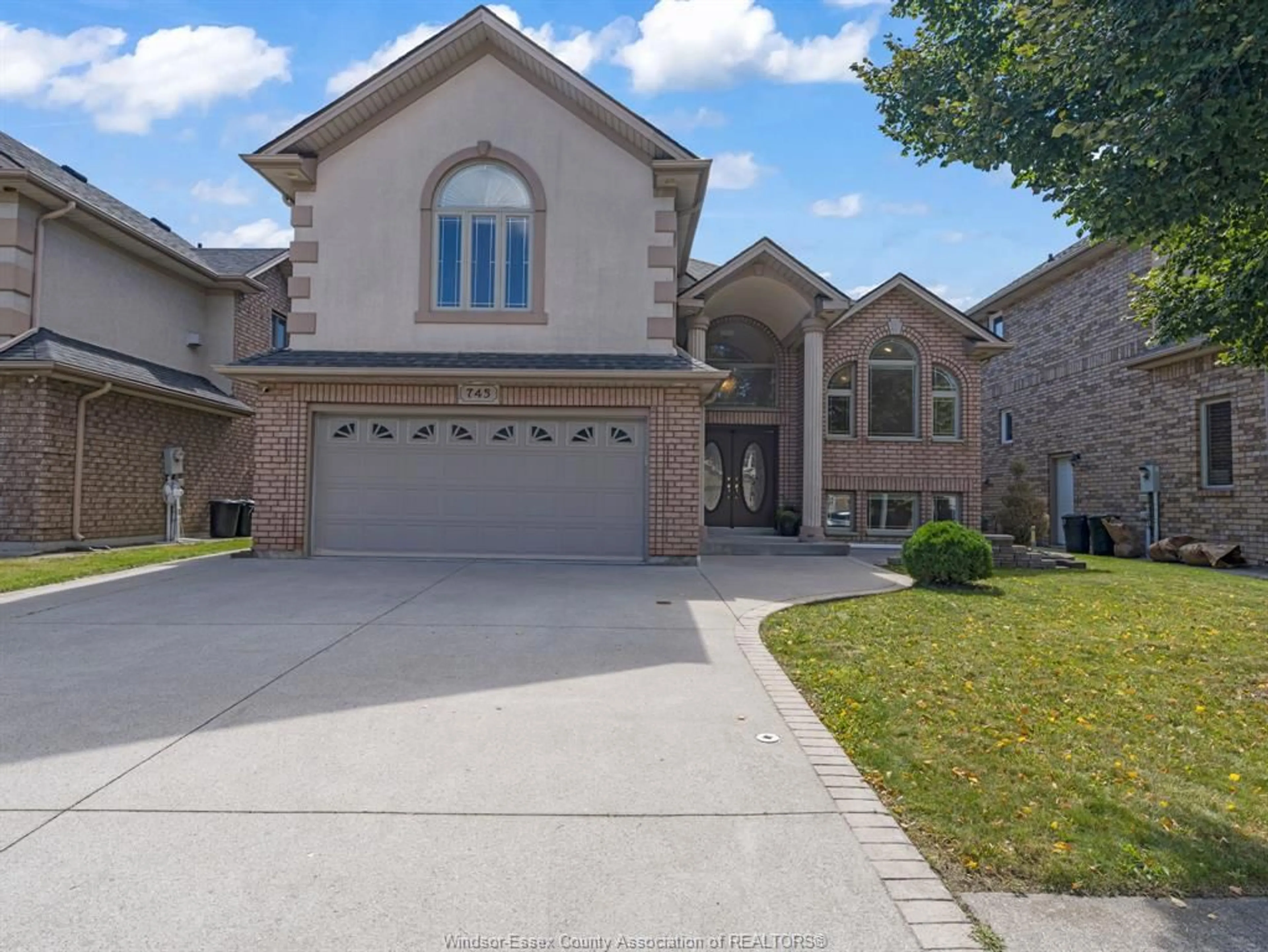 Frontside or backside of a home, the street view for 745 Massimo Cres, Windsor Ontario N9G 3C7