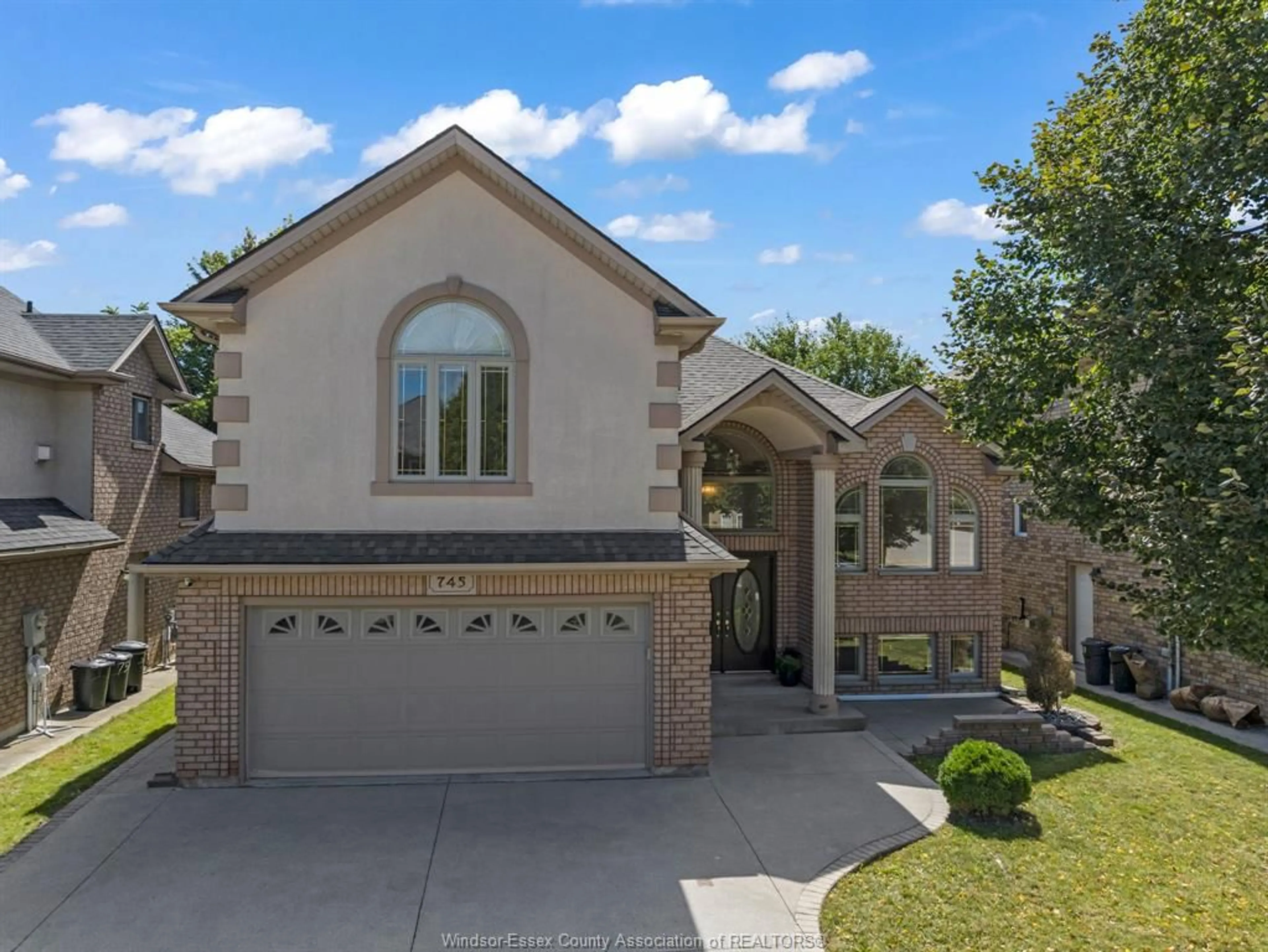 Frontside or backside of a home, the street view for 745 Massimo Cres, Windsor Ontario N9G 3C7