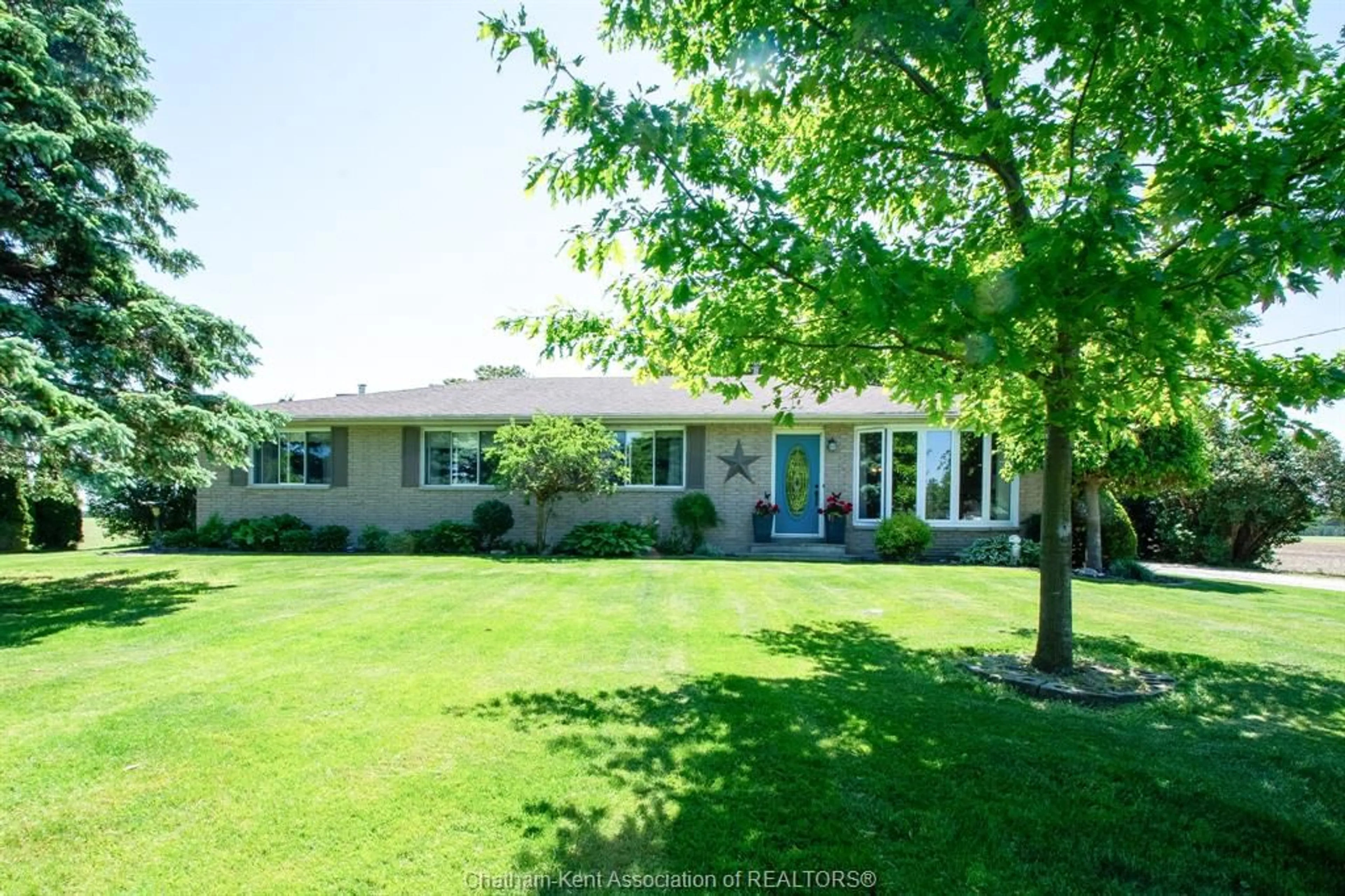 Frontside or backside of a home, the fenced backyard for 10360 Brook Line, Dresden Ontario N0P 1M0