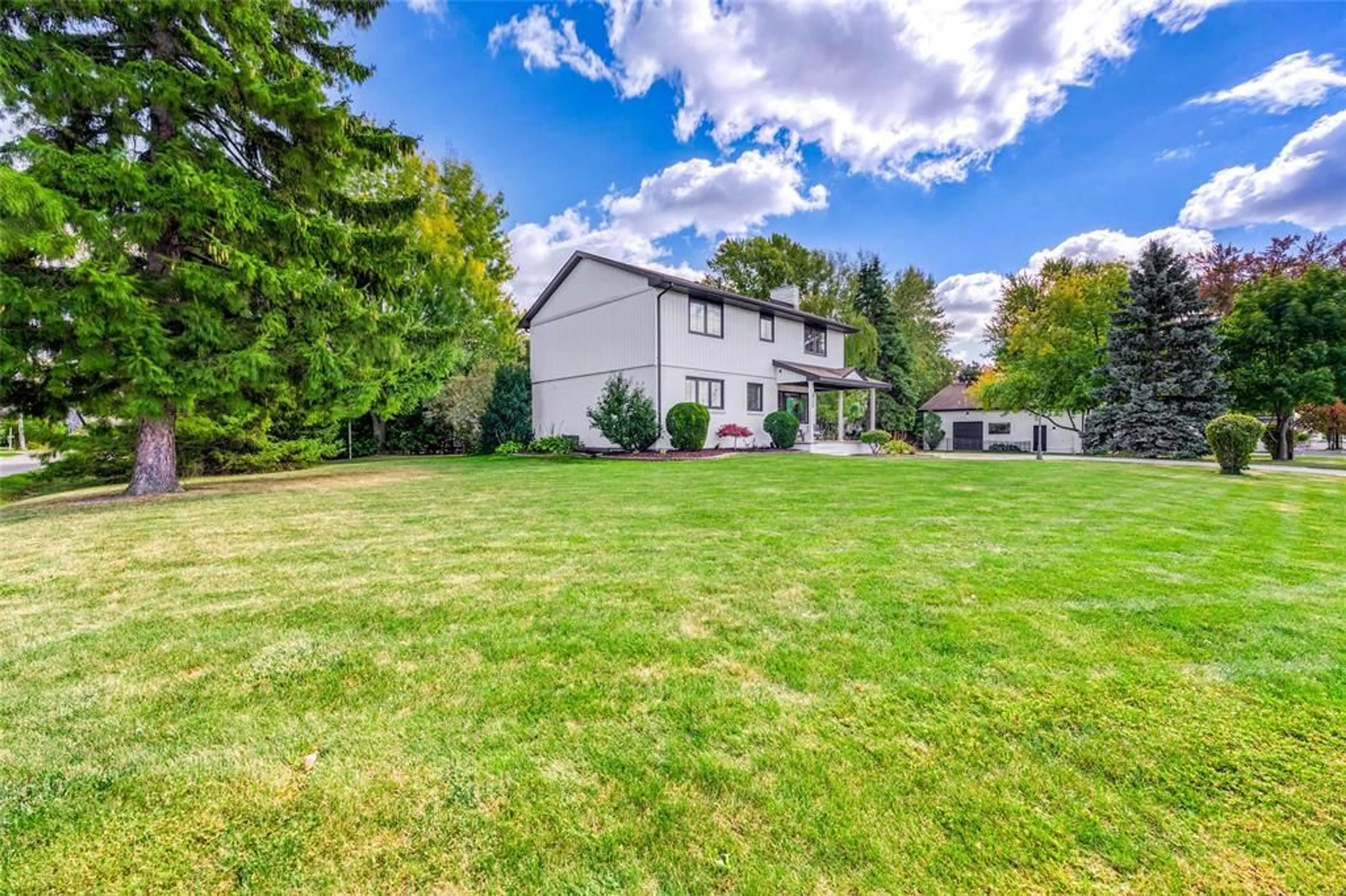 Frontside or backside of a home, the fenced backyard for 6730 O'BANWELL St, Plympton-Wyoming Ontario N0N1E0