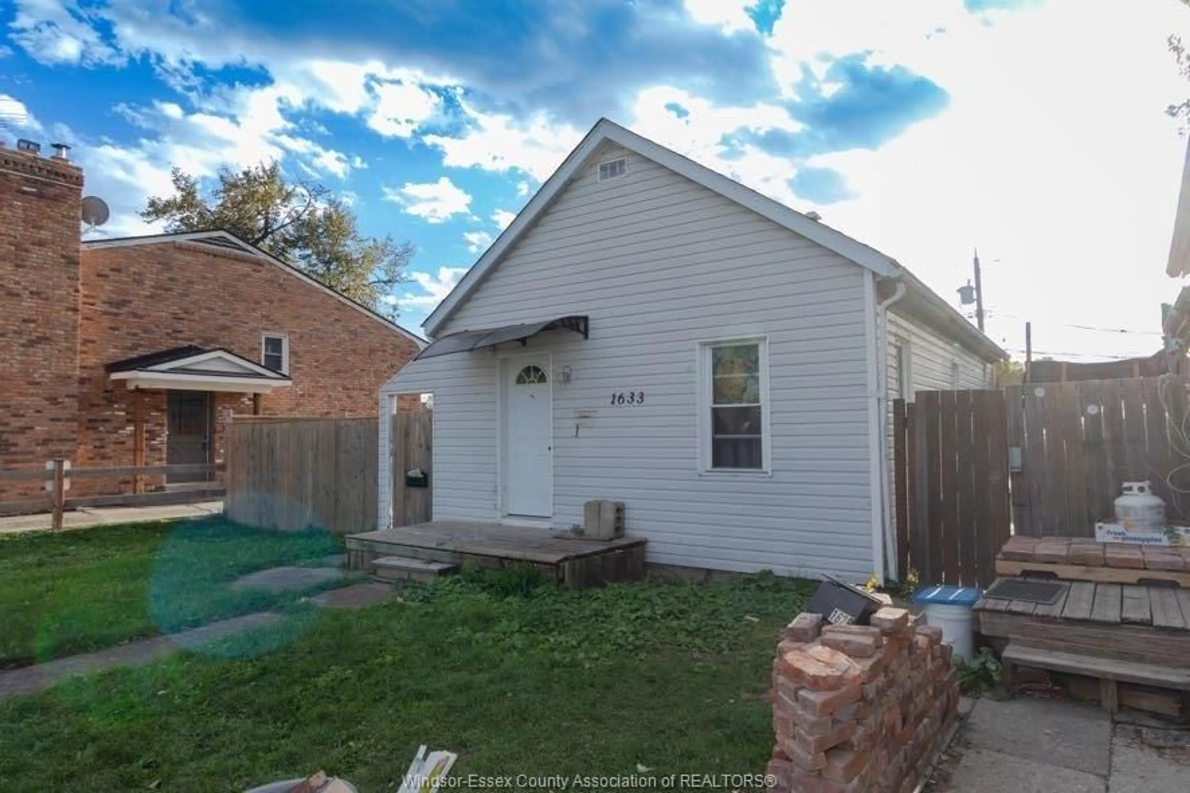 Frontside or backside of a home, the fenced backyard for 1633 PARENT, Windsor Ontario N8X 4J9