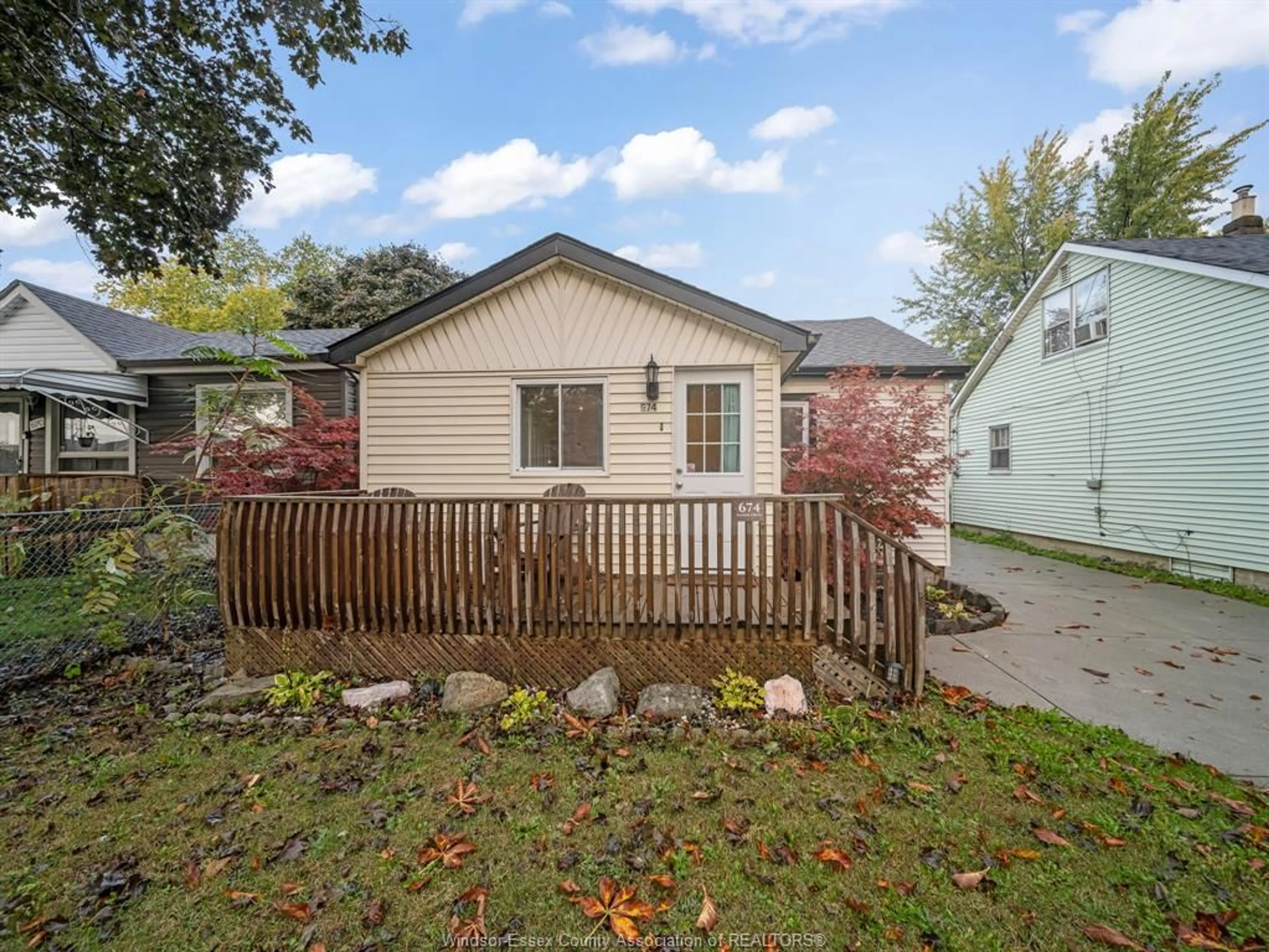 Frontside or backside of a home, the fenced backyard for 674 Eugenie St, Windsor Ontario N8X 3Y4