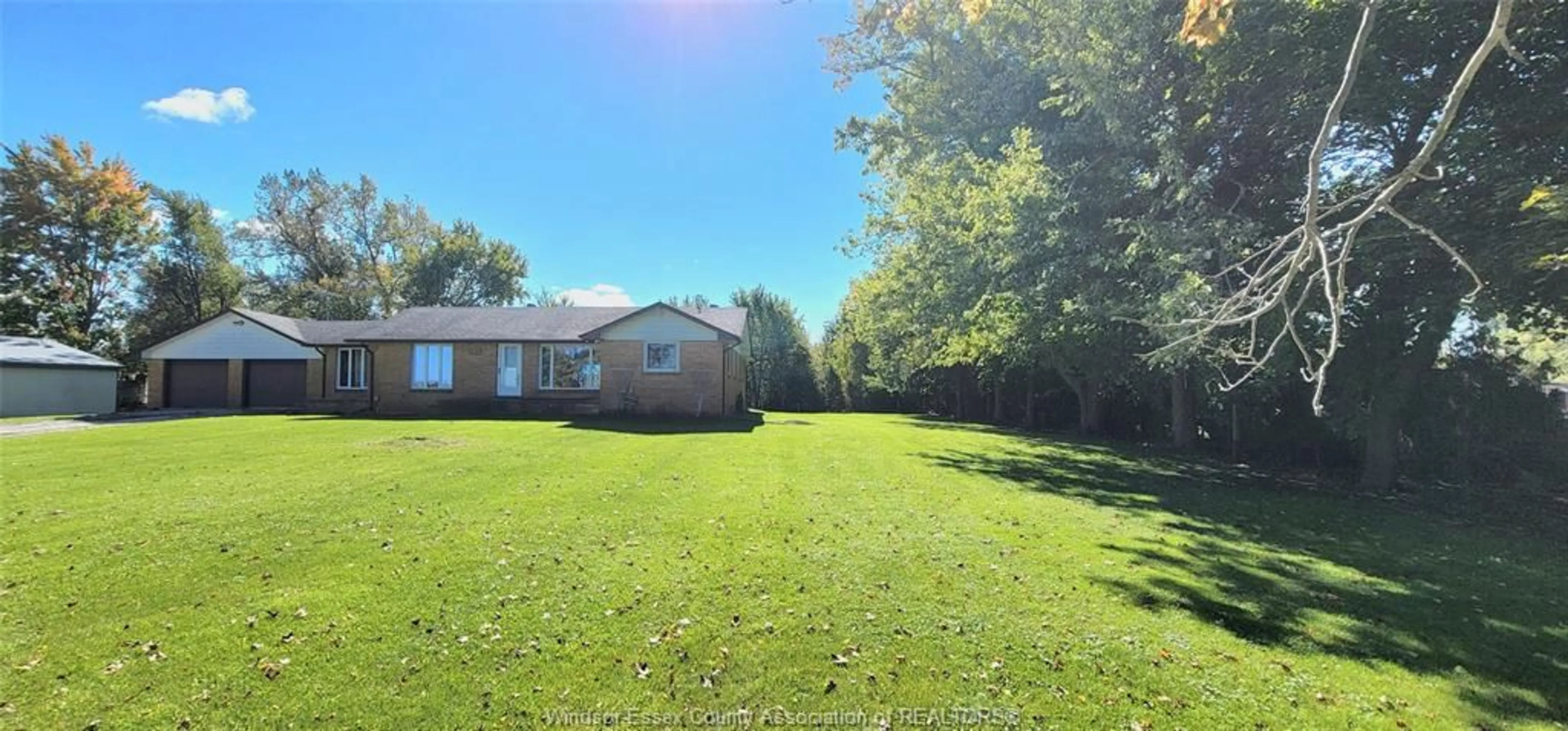 Frontside or backside of a home, the fenced backyard for 7155 7th CONCESSION Rd, Amherstburg Ontario N9V 2Y1